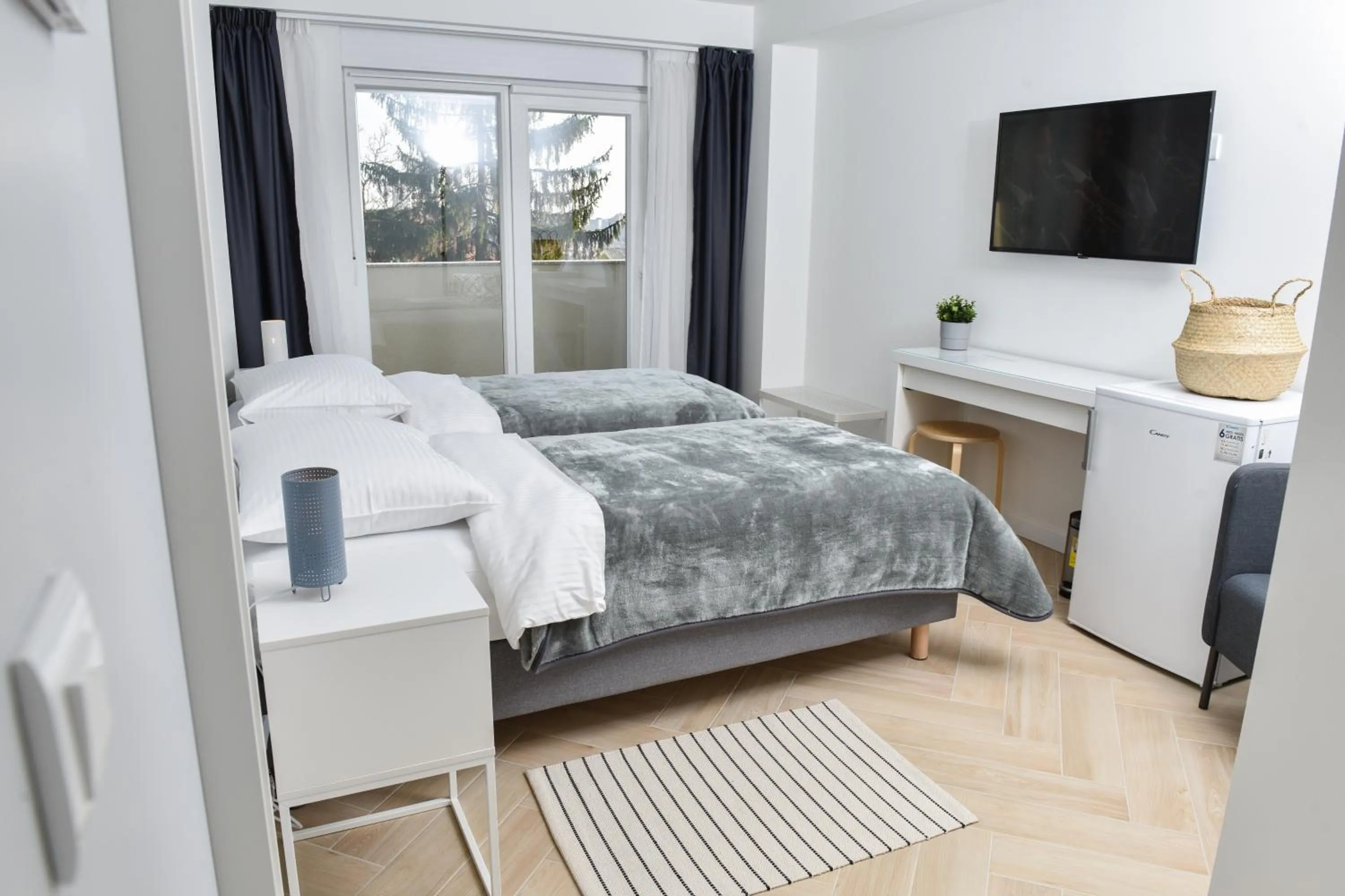 Bed in Rooms at Zajčeva 34