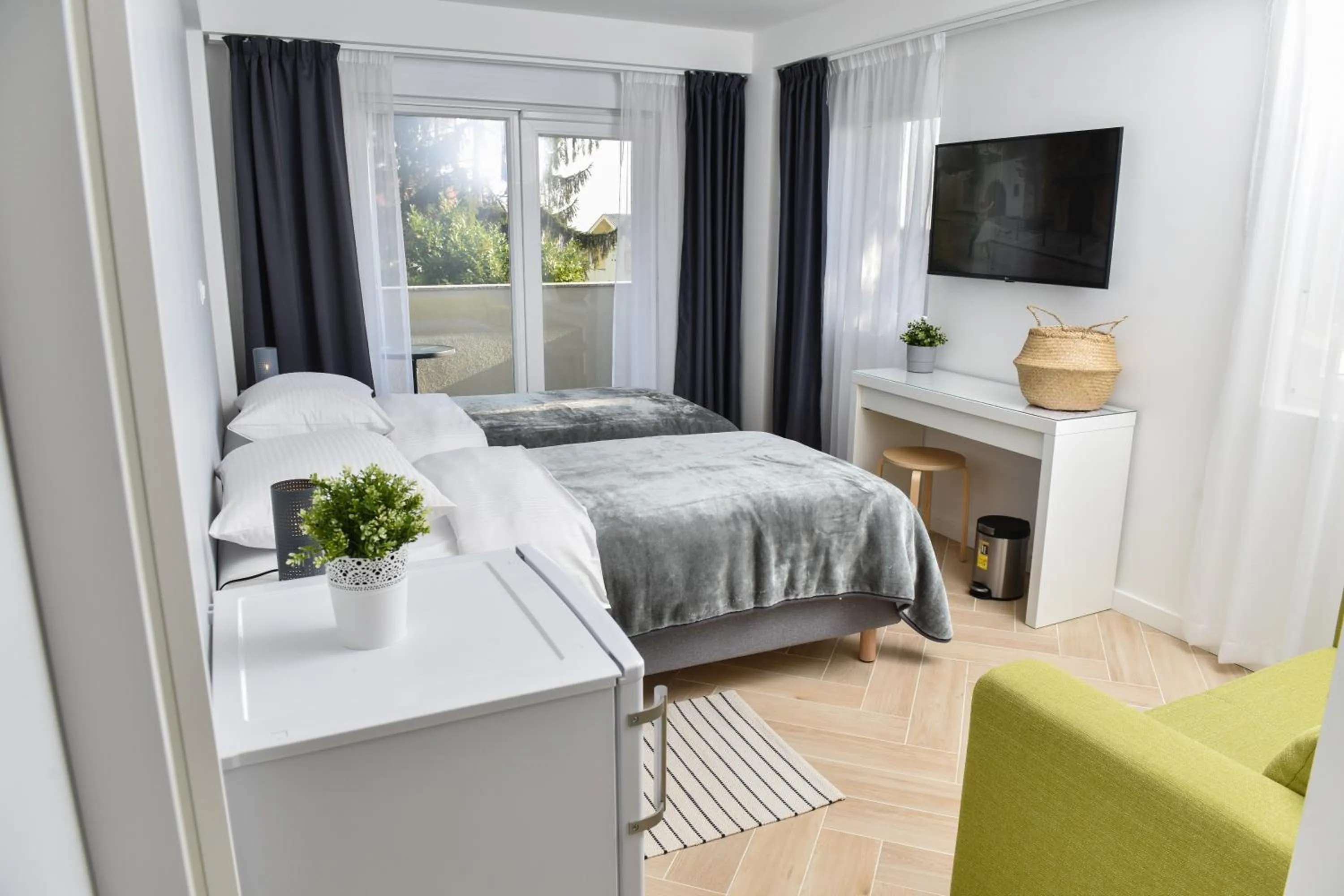 Bed in Rooms at Zajčeva 34