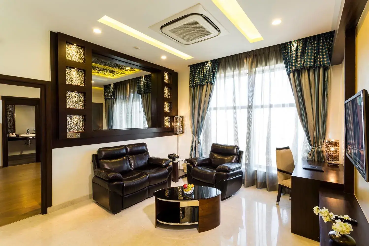 Living room in Clarks Exotica Convention Resort & Spa Living room in Clarks Exotica Convention Resort & Spa