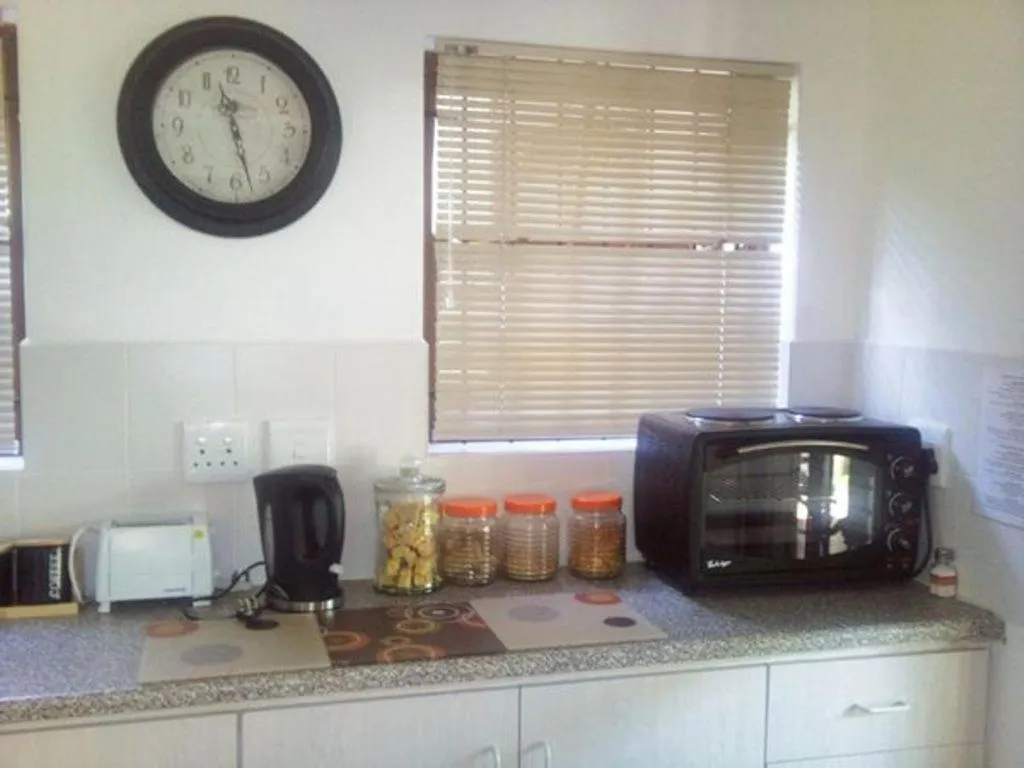 Kitchen or kitchenette in Magnolia Place Guest Houses