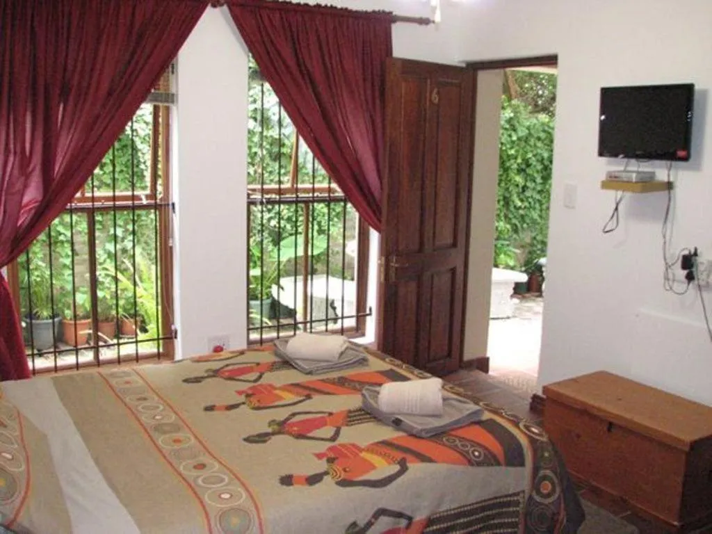 Bed in Magnolia Place Guest Houses