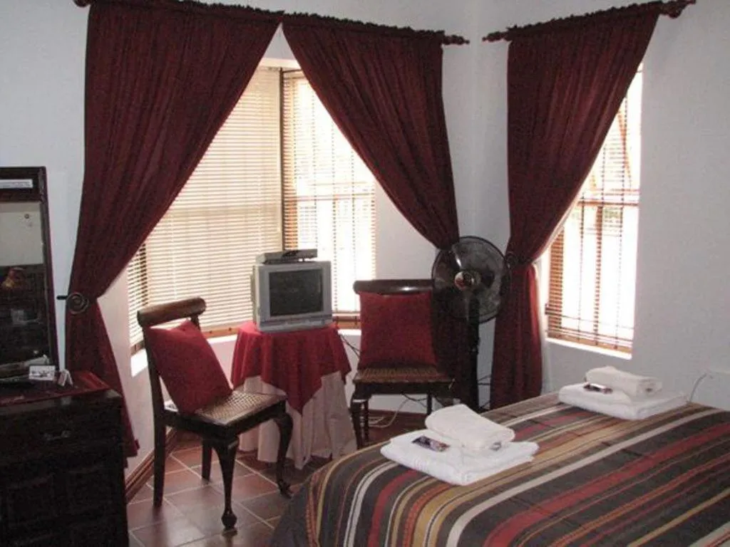 Bed in Magnolia Place Guest Houses