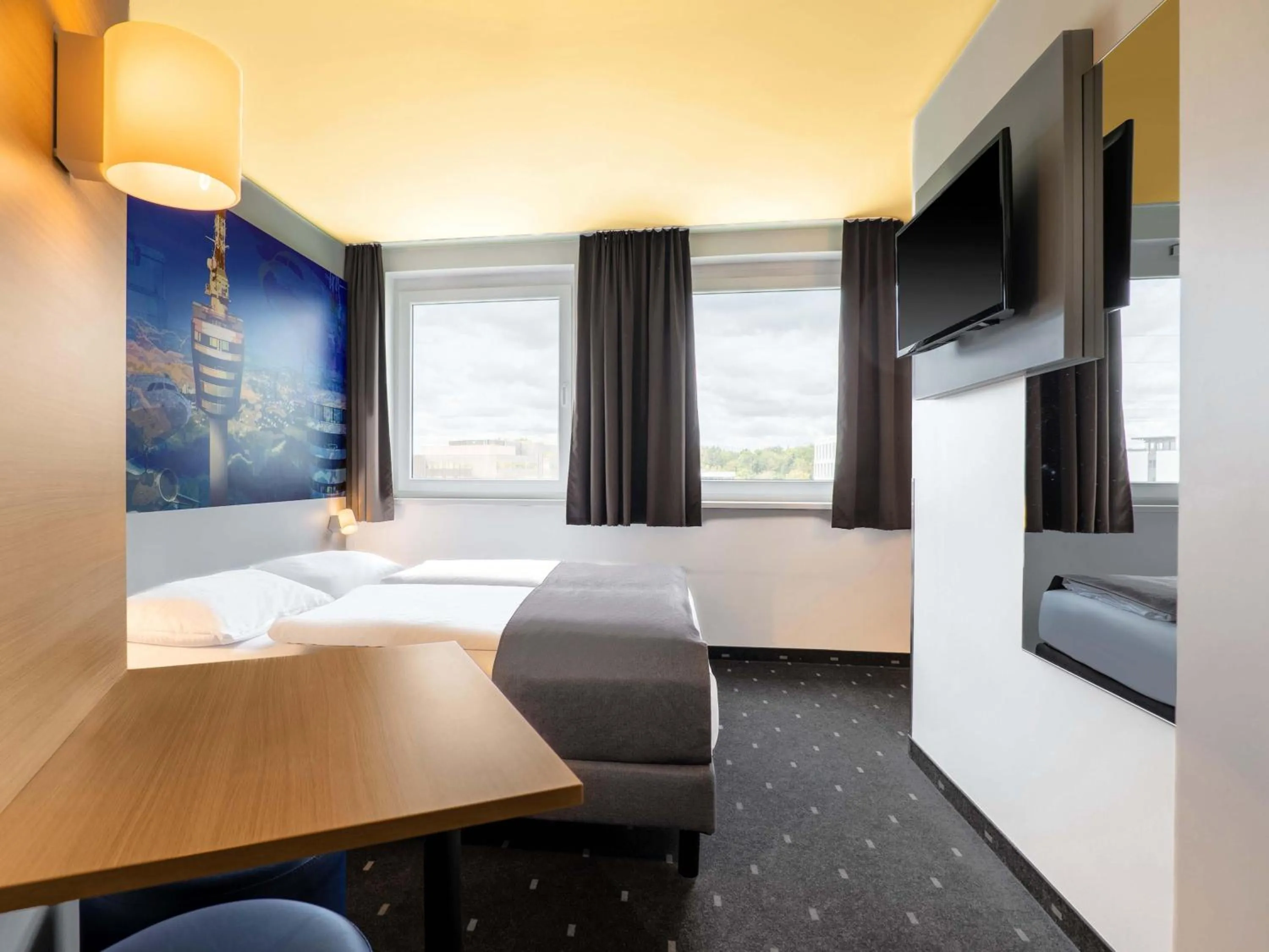 Photo of the whole room, Bed in B&B Hotel Stuttgart-Airport/Messe