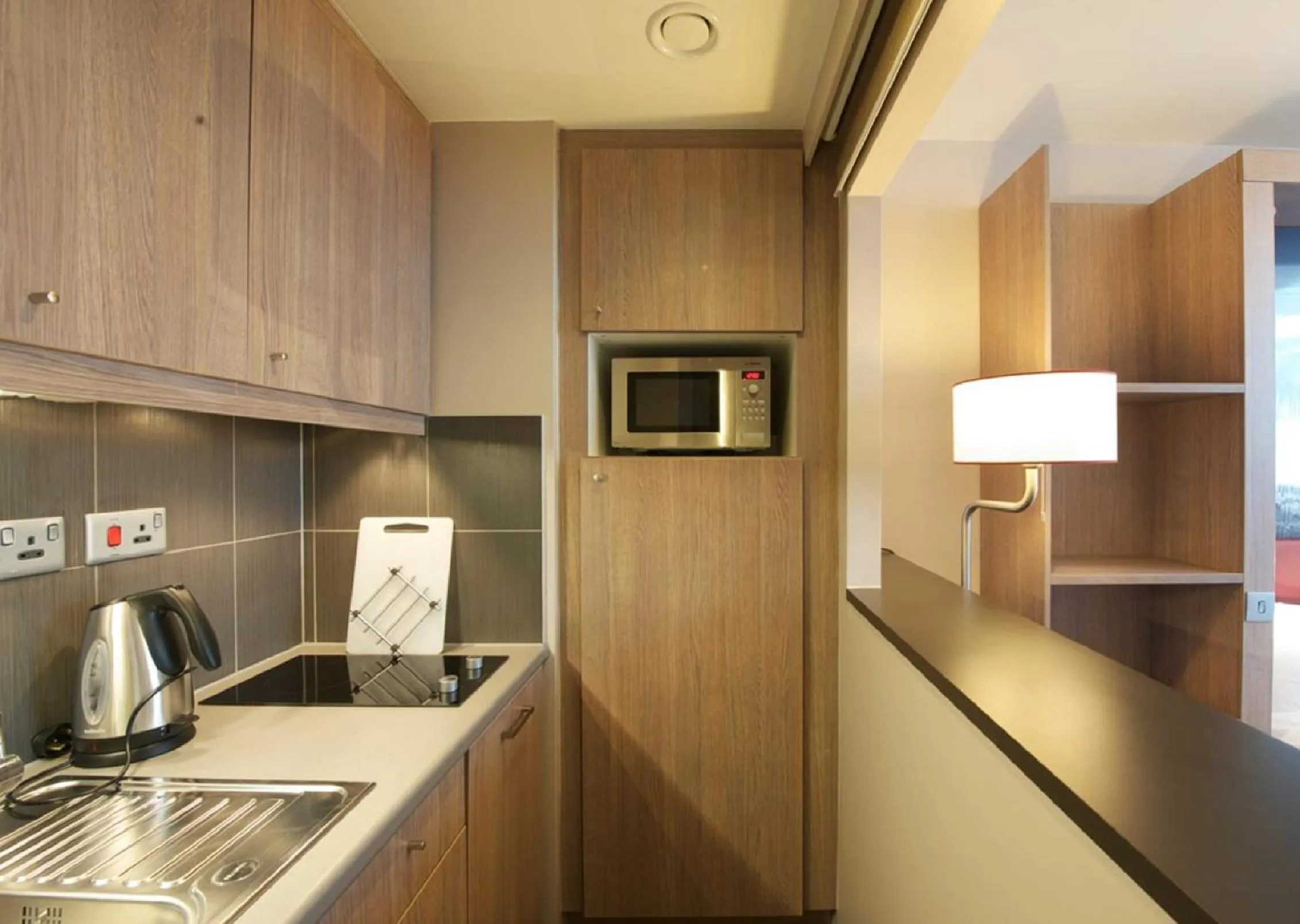 Kitchen or kitchenette in Aparthotel Adagio Liverpool City Centre