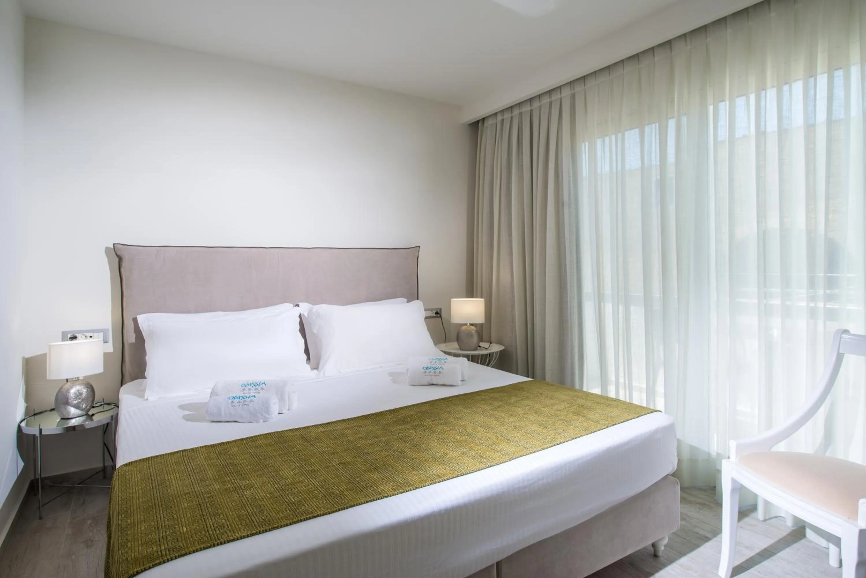 Bed in Odyssia Beach Hotel