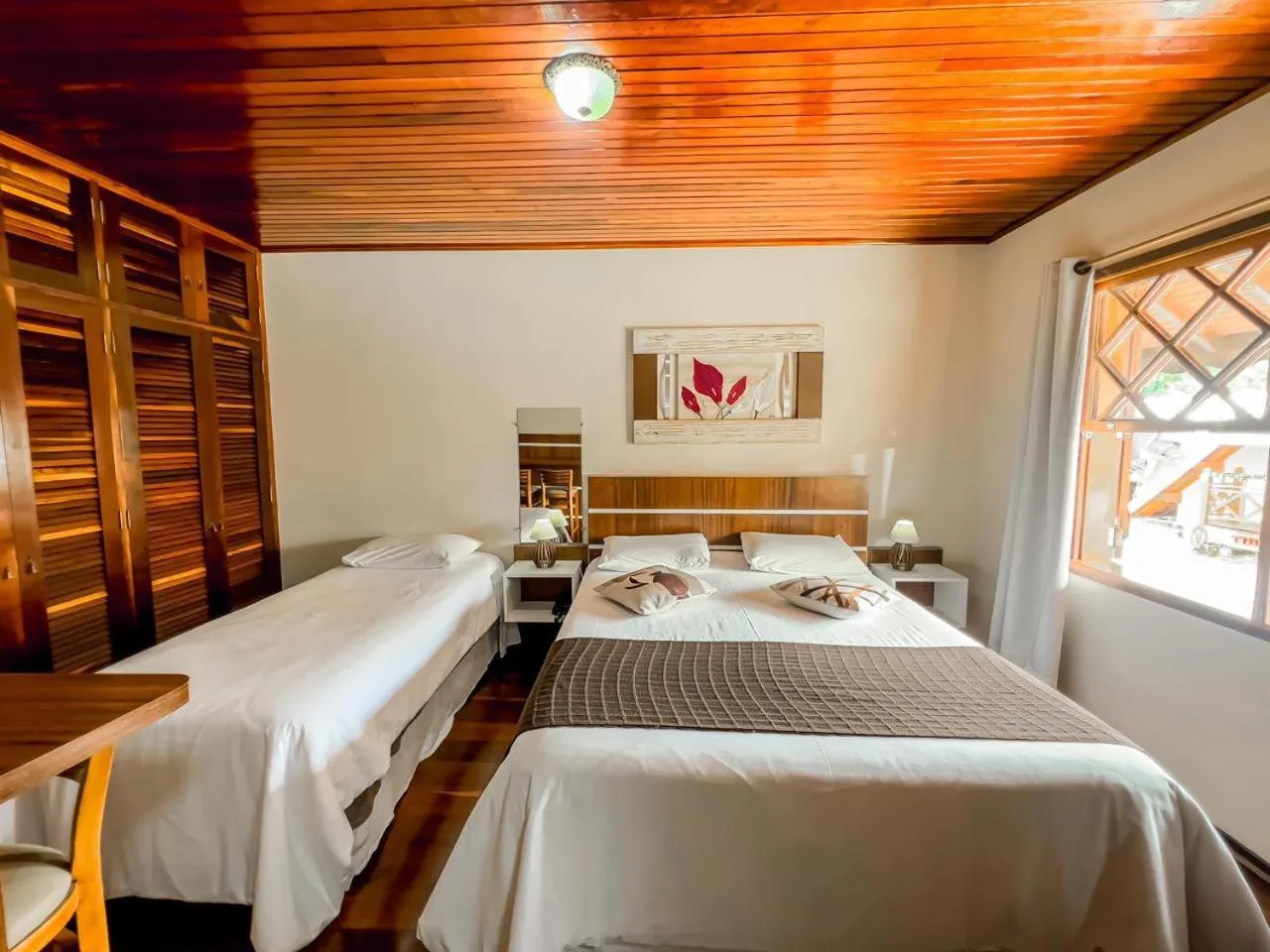 Bed in Pousada Avenida