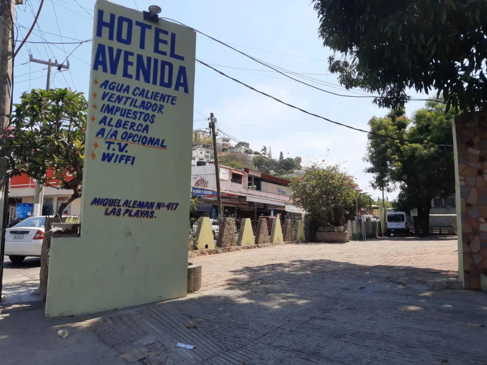 Property logo or sign in Hotel Avenida