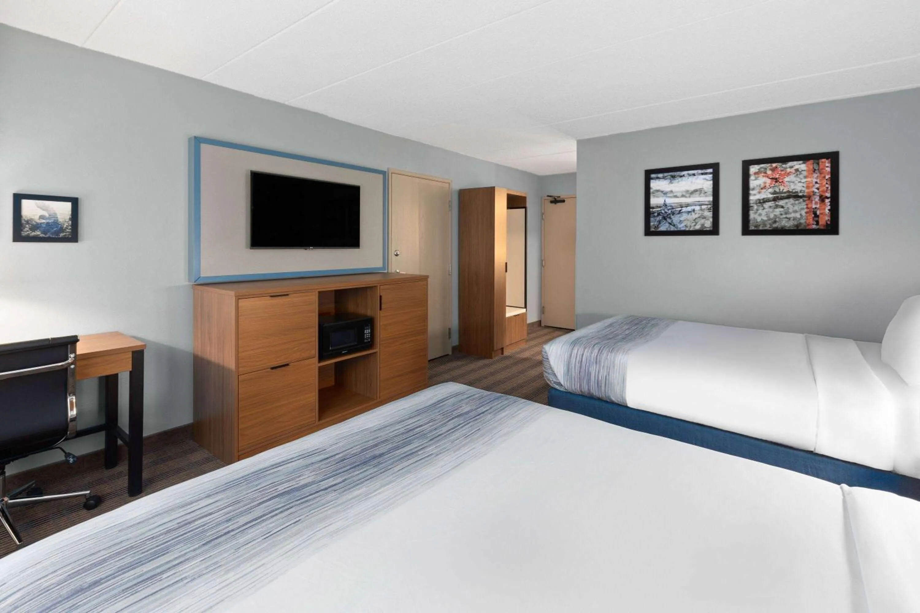 Photo of the whole room, Bed in AmericInn by Wyndham North Branch