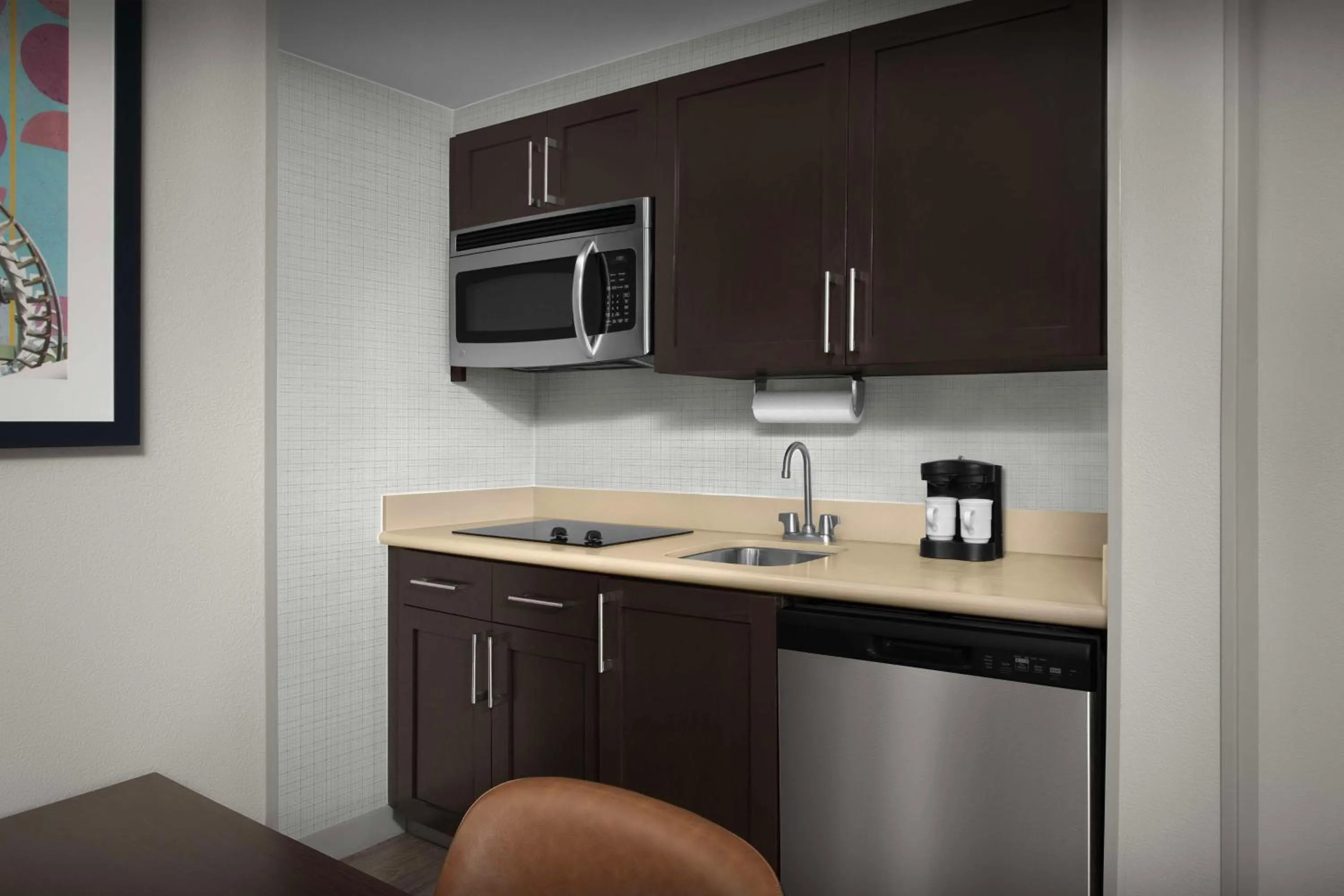 Kitchen or kitchenette in Homewood Suites by Hilton Orlando Airport