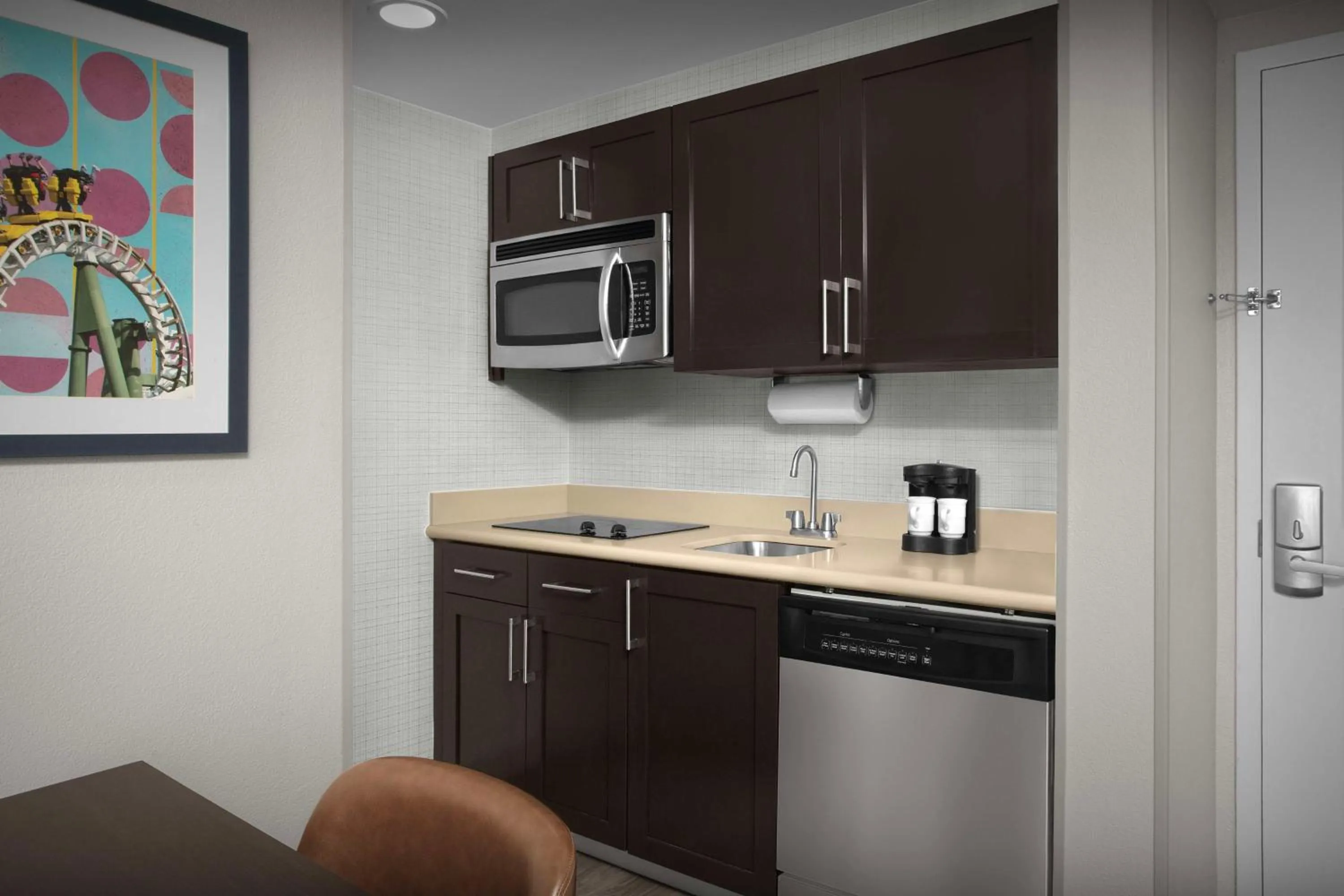 Kitchen or kitchenette in Homewood Suites by Hilton Orlando Airport