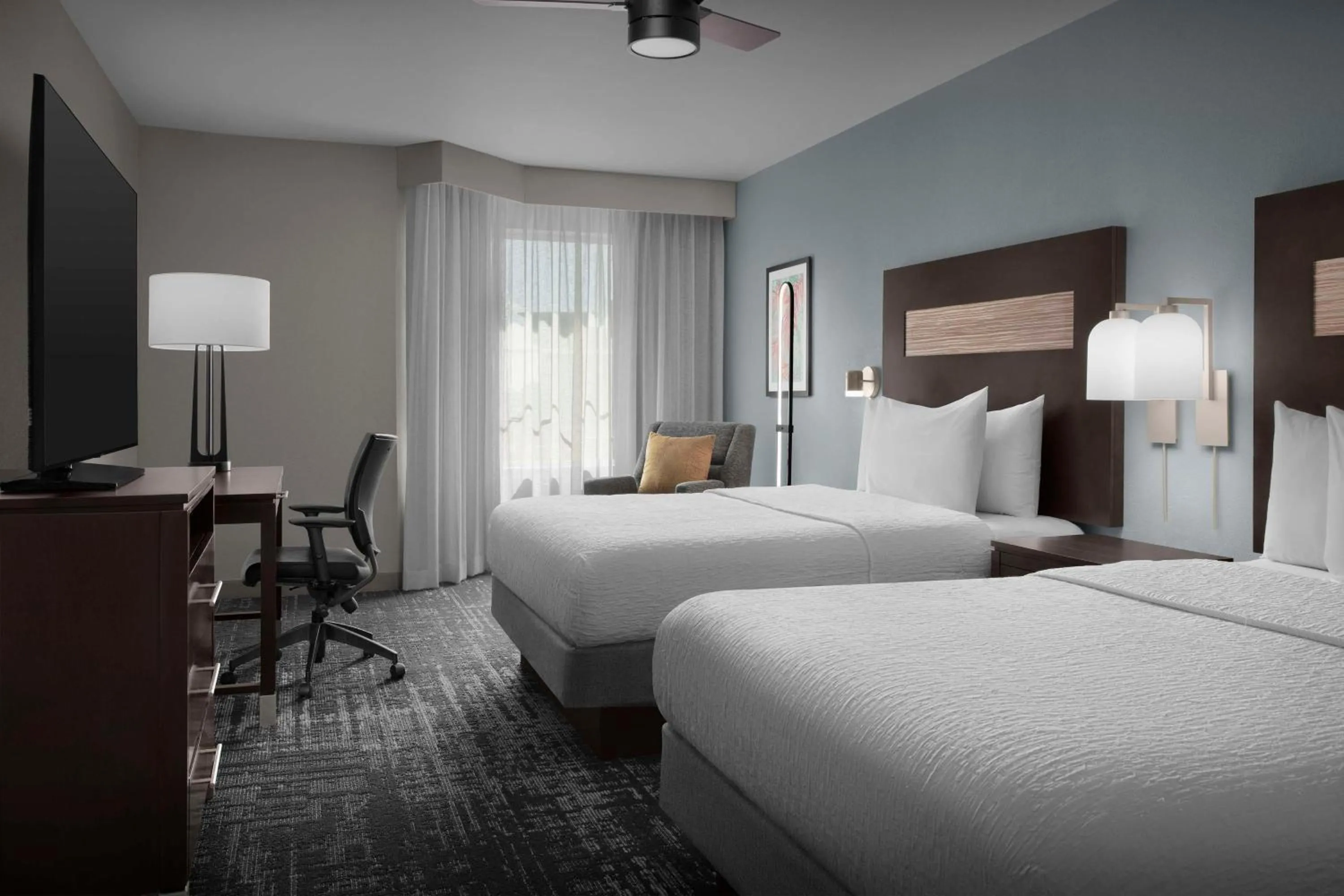 Bed in Homewood Suites by Hilton Orlando Airport