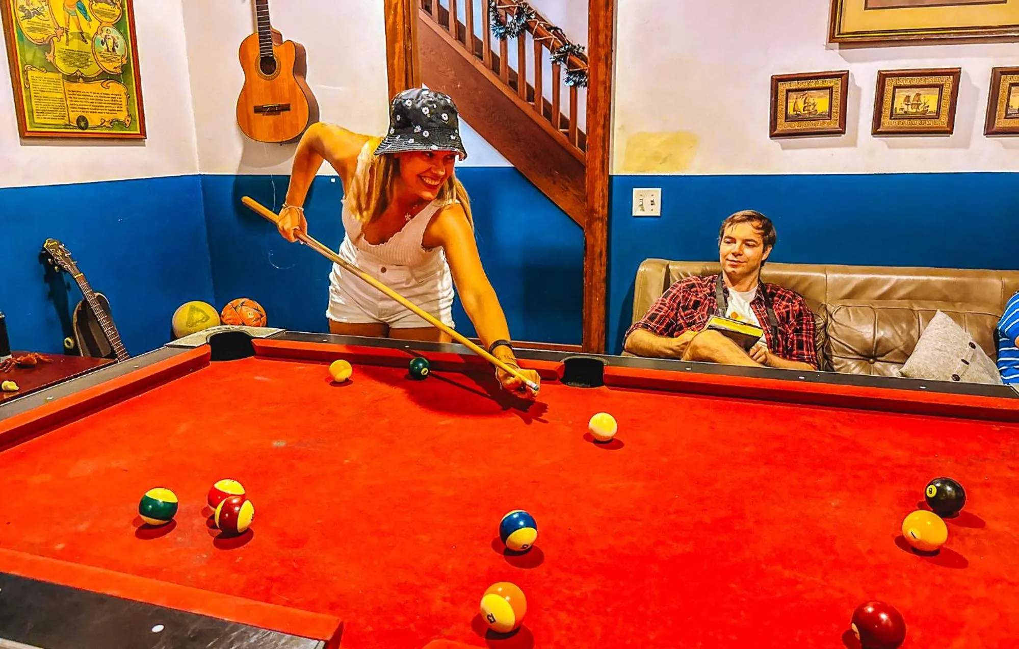 Communal lounge/ TV room in ITH San Diego Adventure Hostel