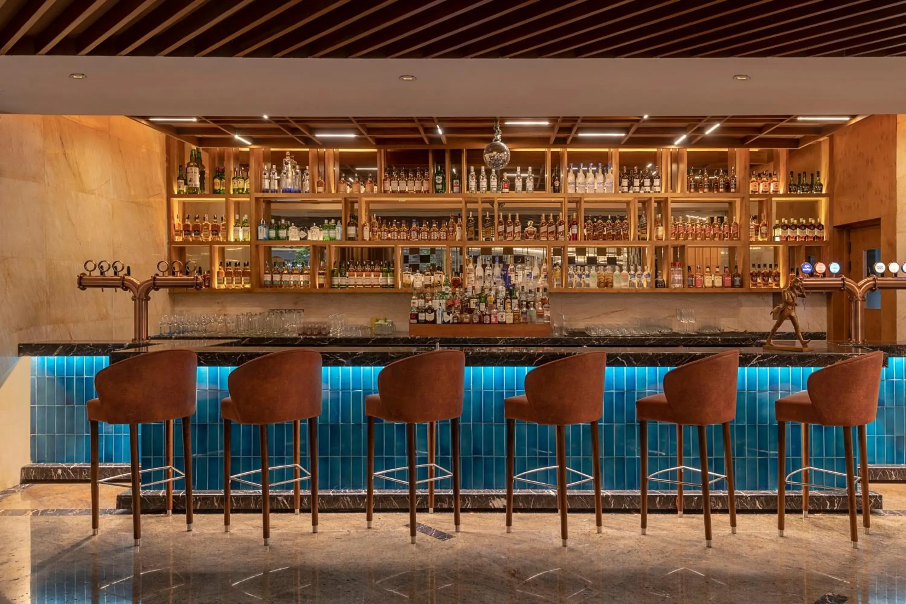 Lounge or bar in Radisson Blu Kaushambi Delhi NCR Lounge or bar in Radisson Blu Kaushambi Delhi NCR