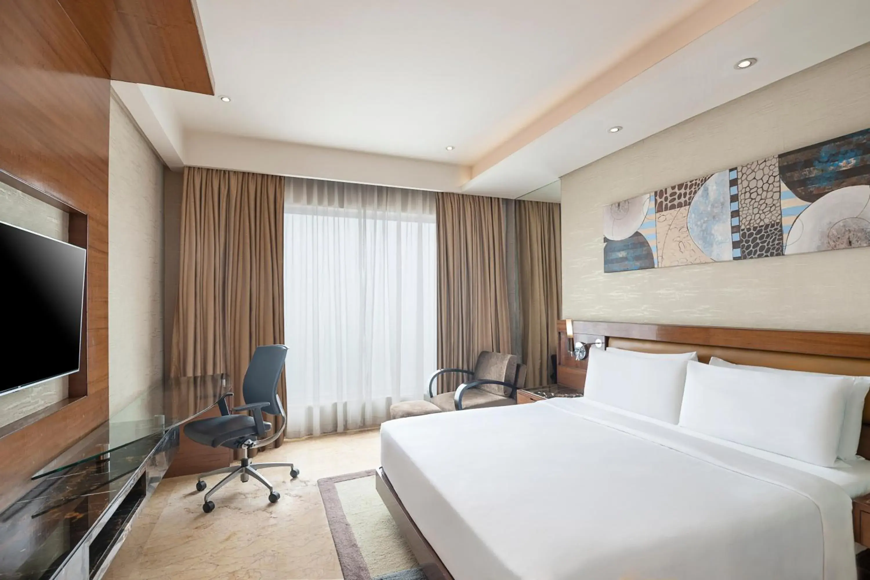 Bedroom, Bed in Radisson Blu Kaushambi Delhi NCR Bedroom, Bed in Radisson Blu Kaushambi Delhi NCR