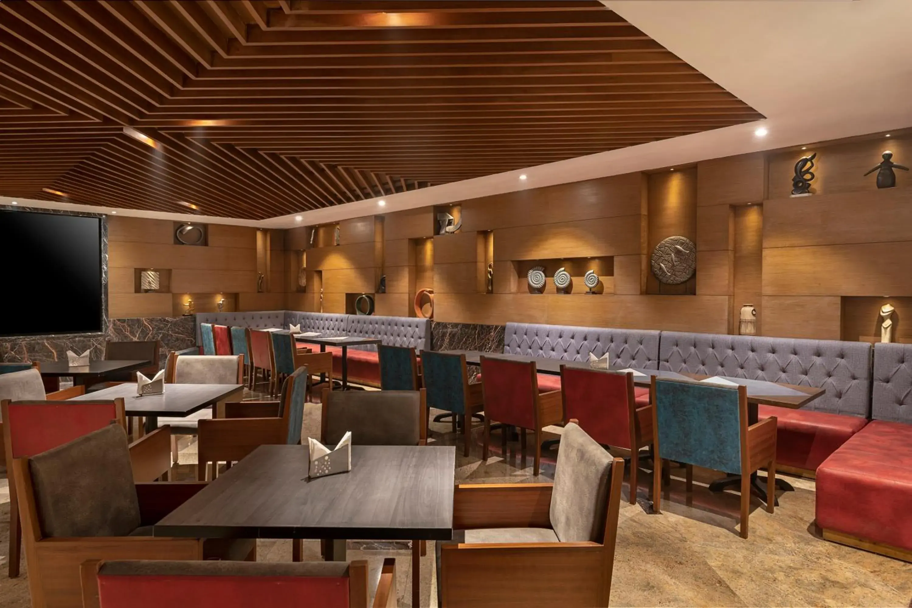 Lounge or bar in Radisson Blu Kaushambi Delhi NCR Lounge or bar in Radisson Blu Kaushambi Delhi NCR