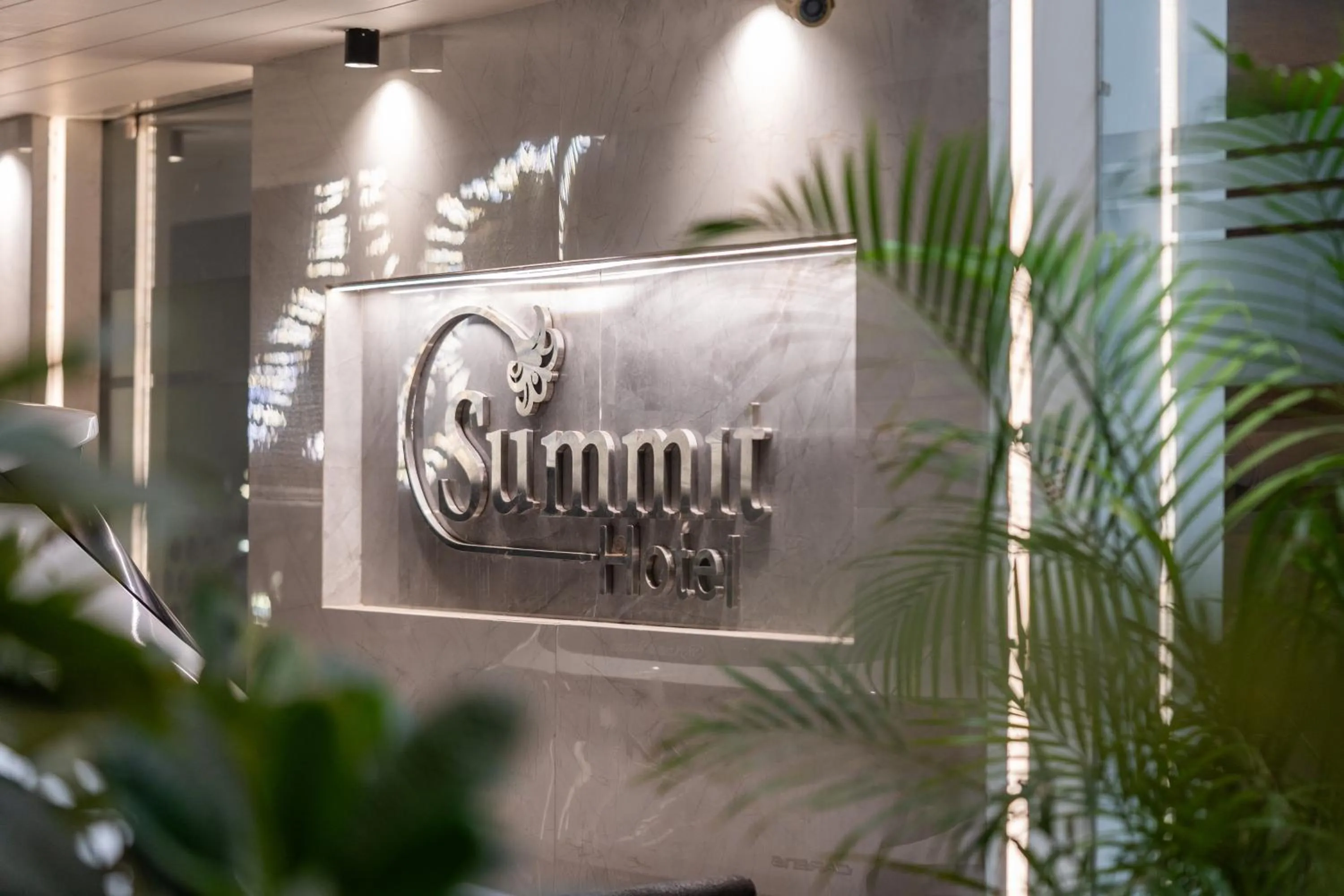 Property logo or sign in Hotel Summit