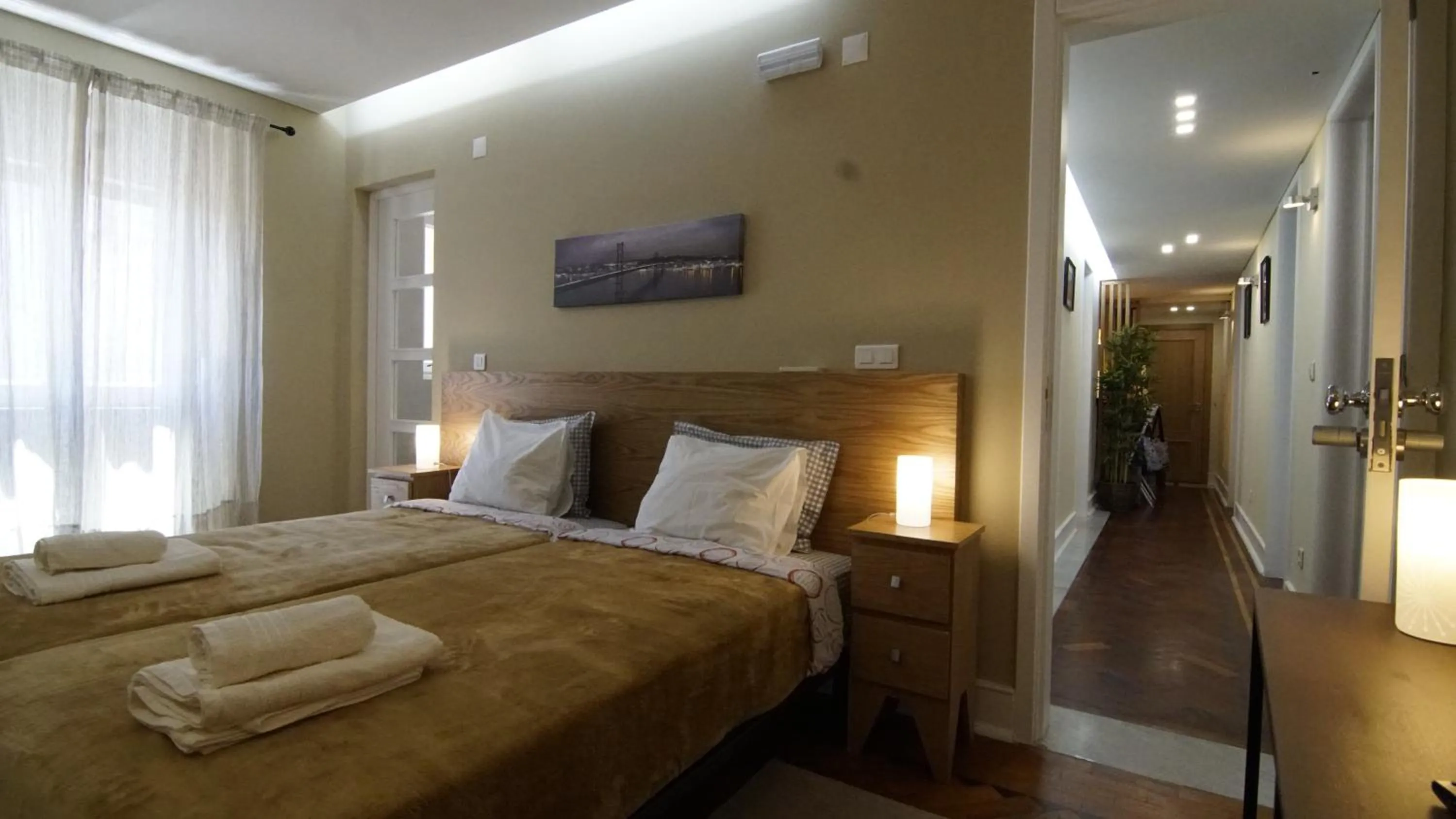 Bed in Avenida Cozy Apartment