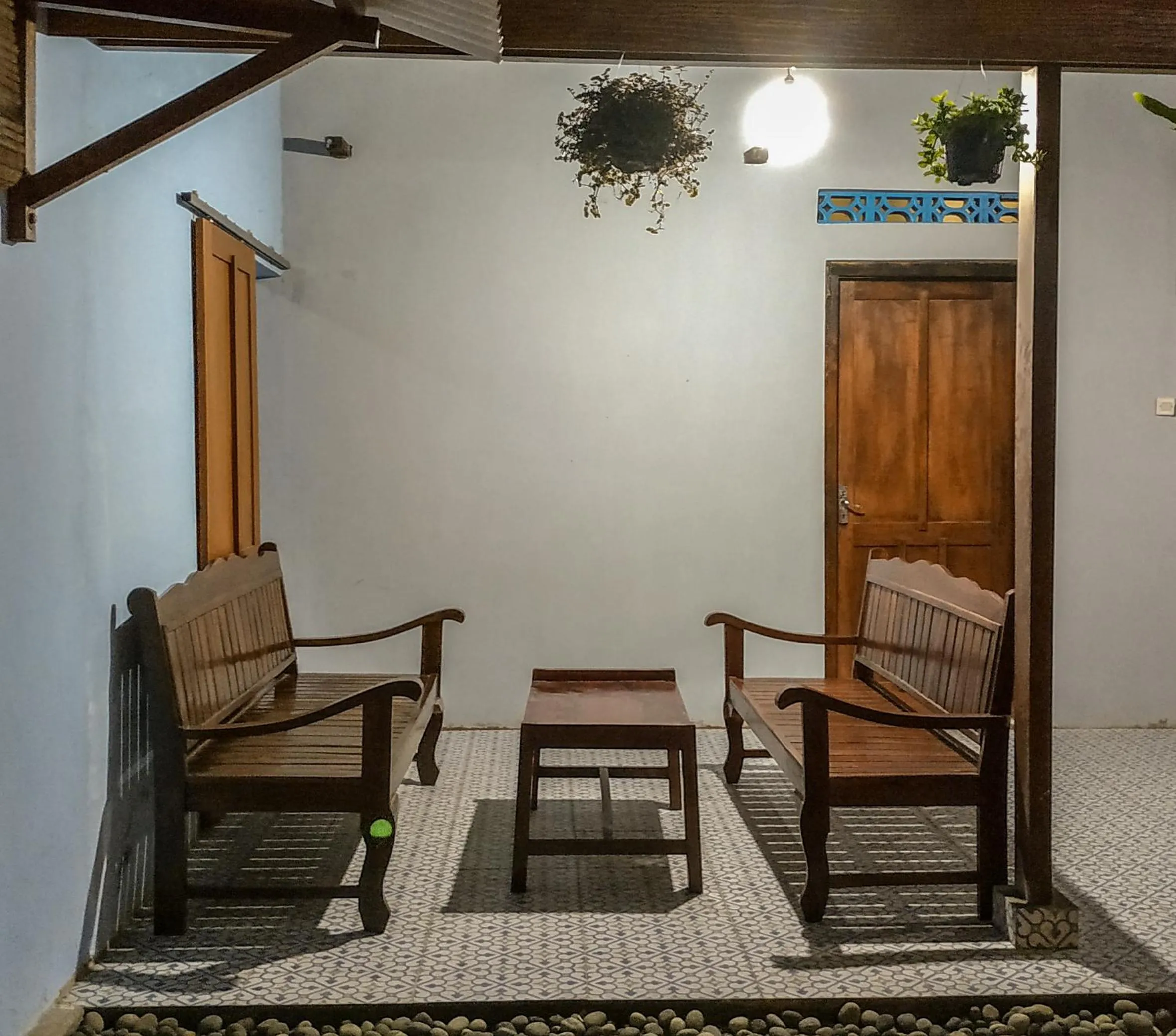 Living room in Genthong Homestay