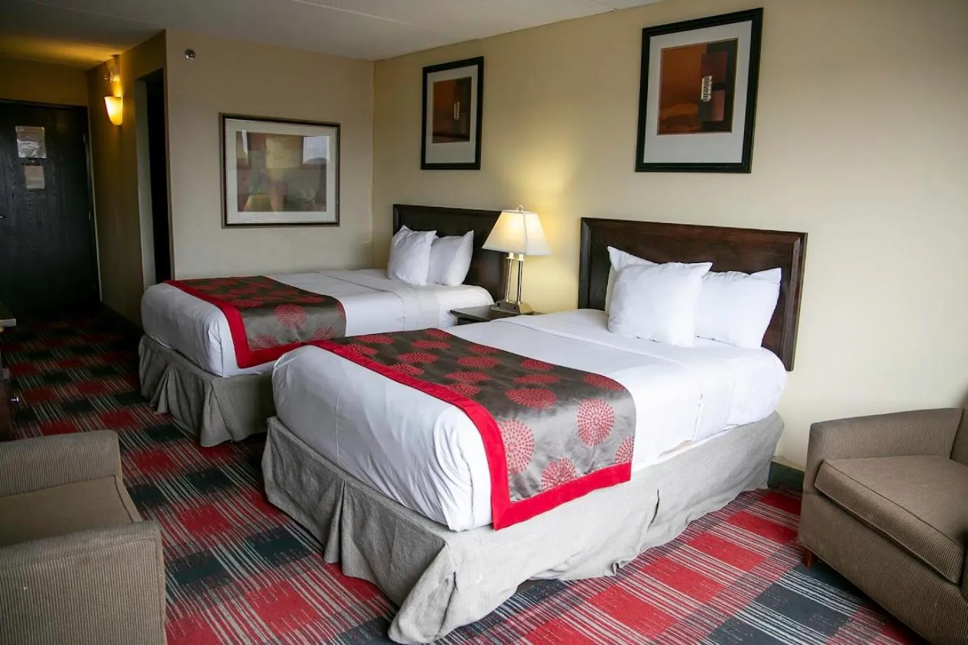 Bed in Albany Plaza Hotel