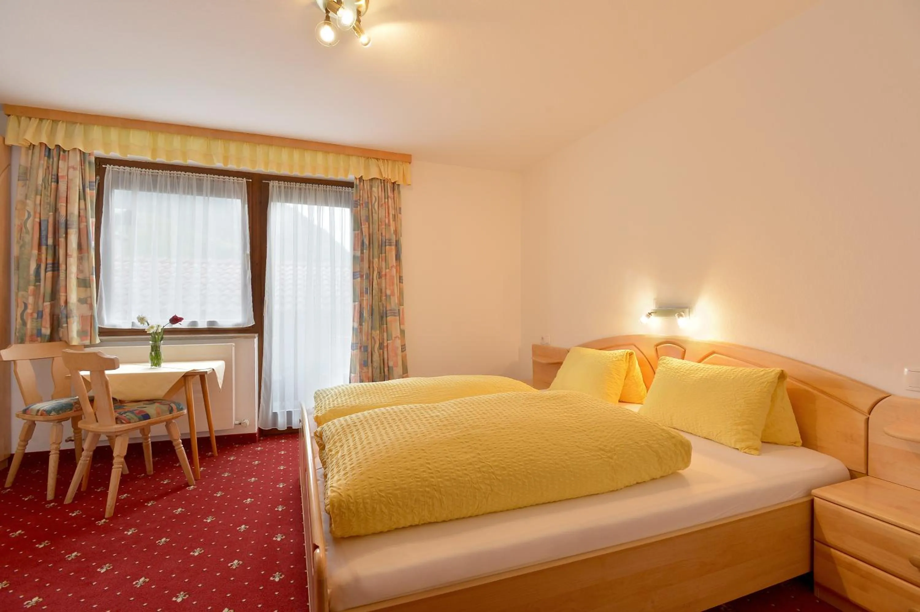 Photo of the whole room, Bed in Gästehaus Sillaber-Gertraud Nuck