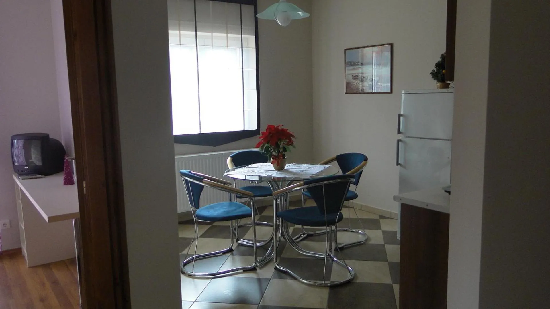Kitchen or kitchenette in Janus Apartman