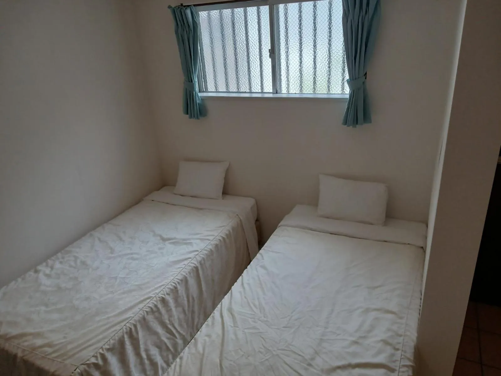 Bed in Hotel Palm Tree Hill