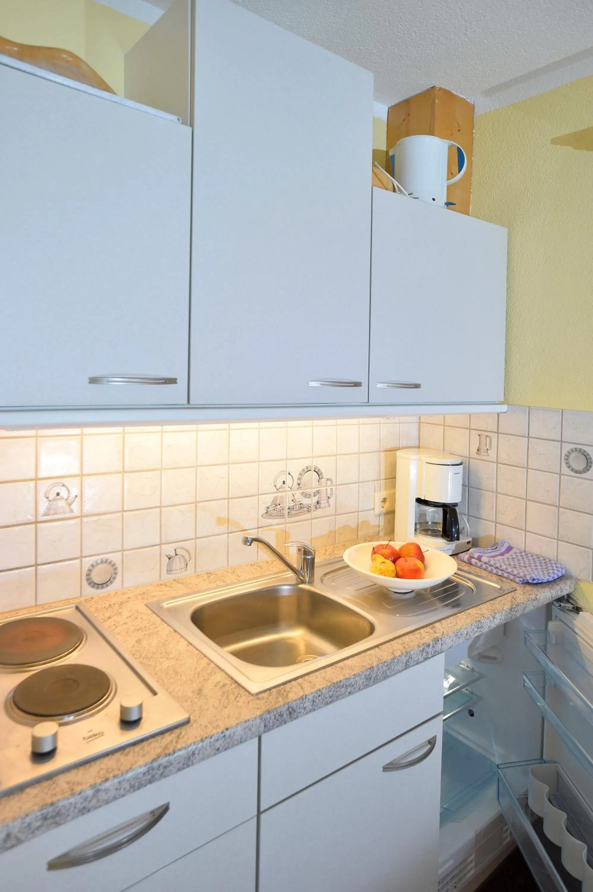 Kitchen or kitchenette in Pension und Apartments Landhaus Marie