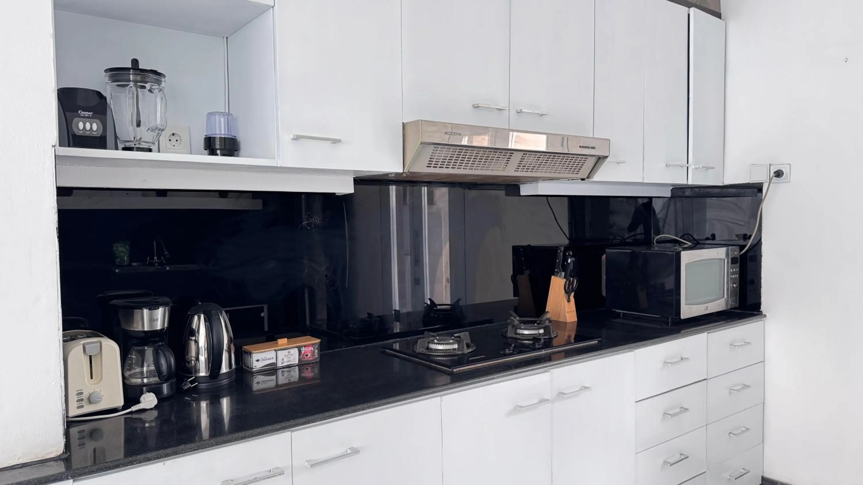 Kitchen or kitchenette in Casa Priya Canggu