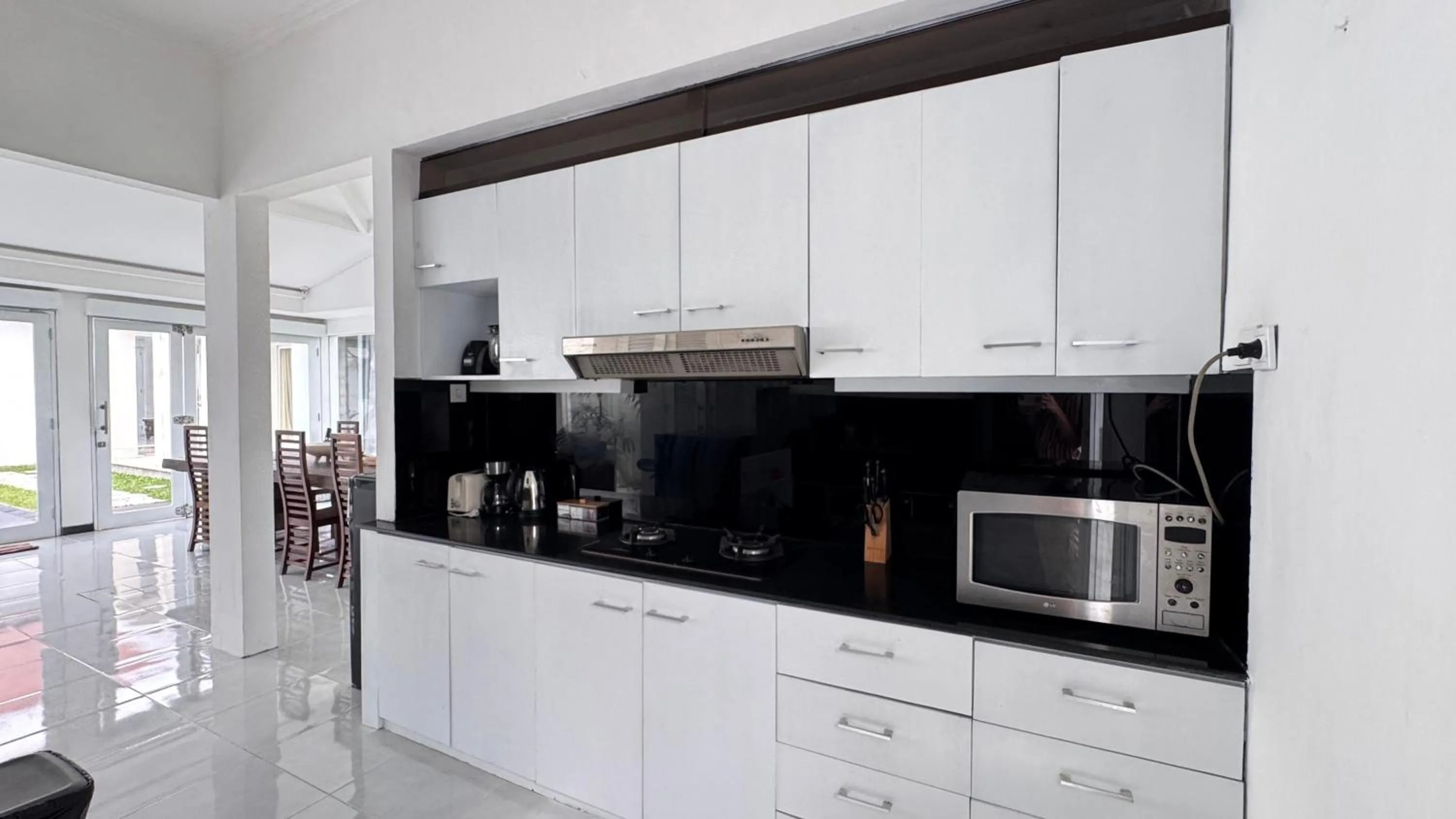 Kitchen or kitchenette in Casa Priya Canggu