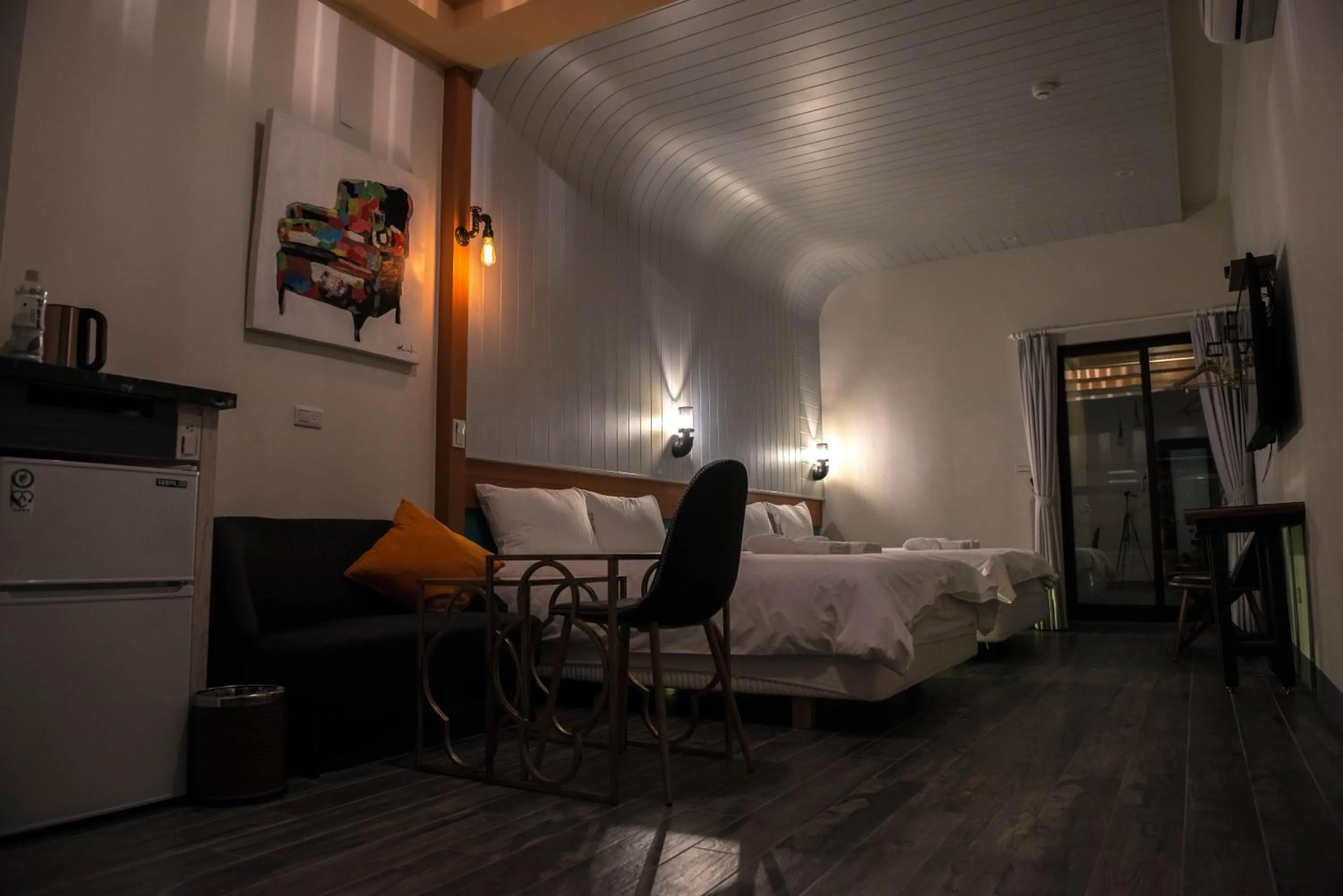 Bed in Happy Wing Guesthouse