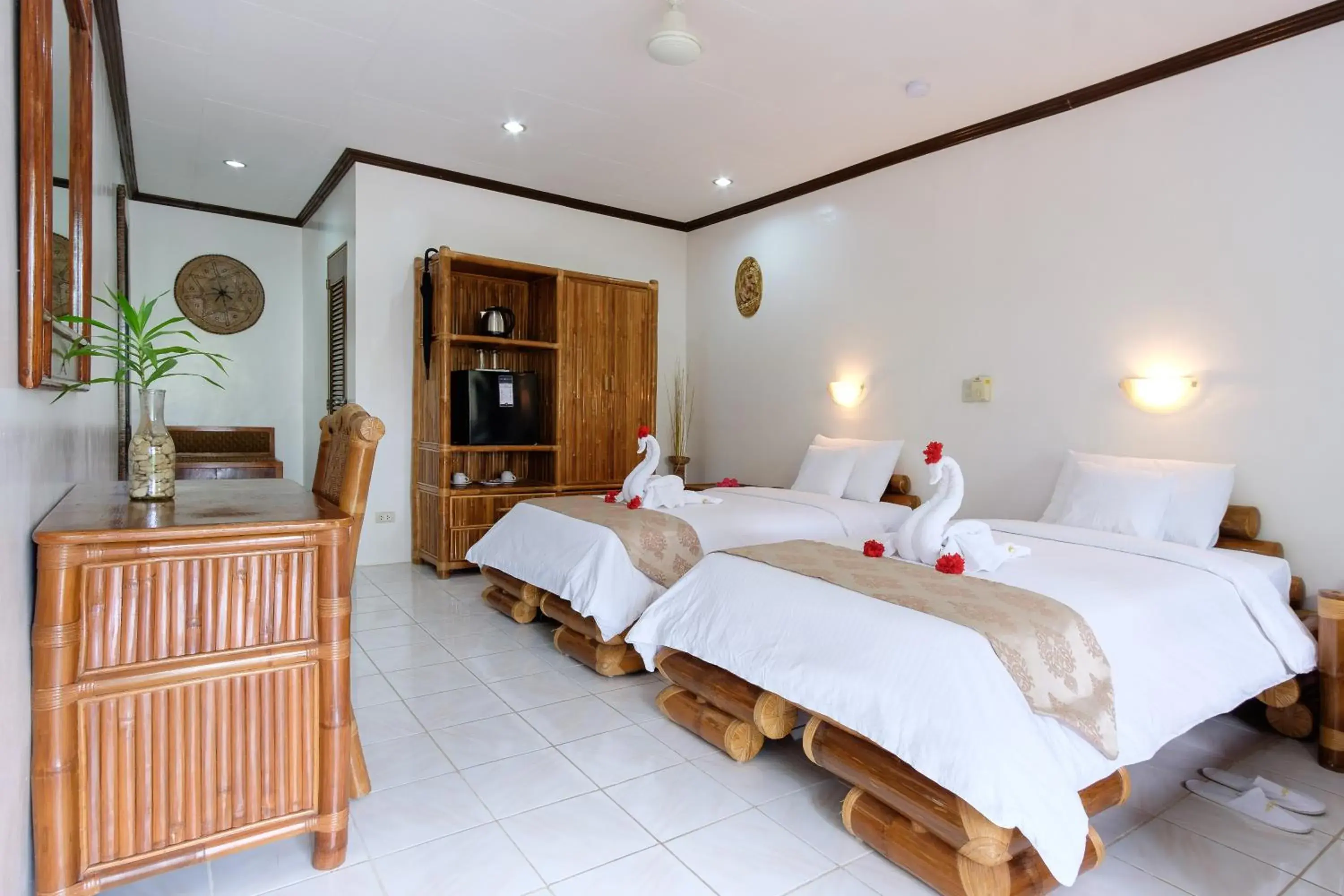 Bed in Kasai Village Dive Resort Bed in Kasai Village Dive Resort