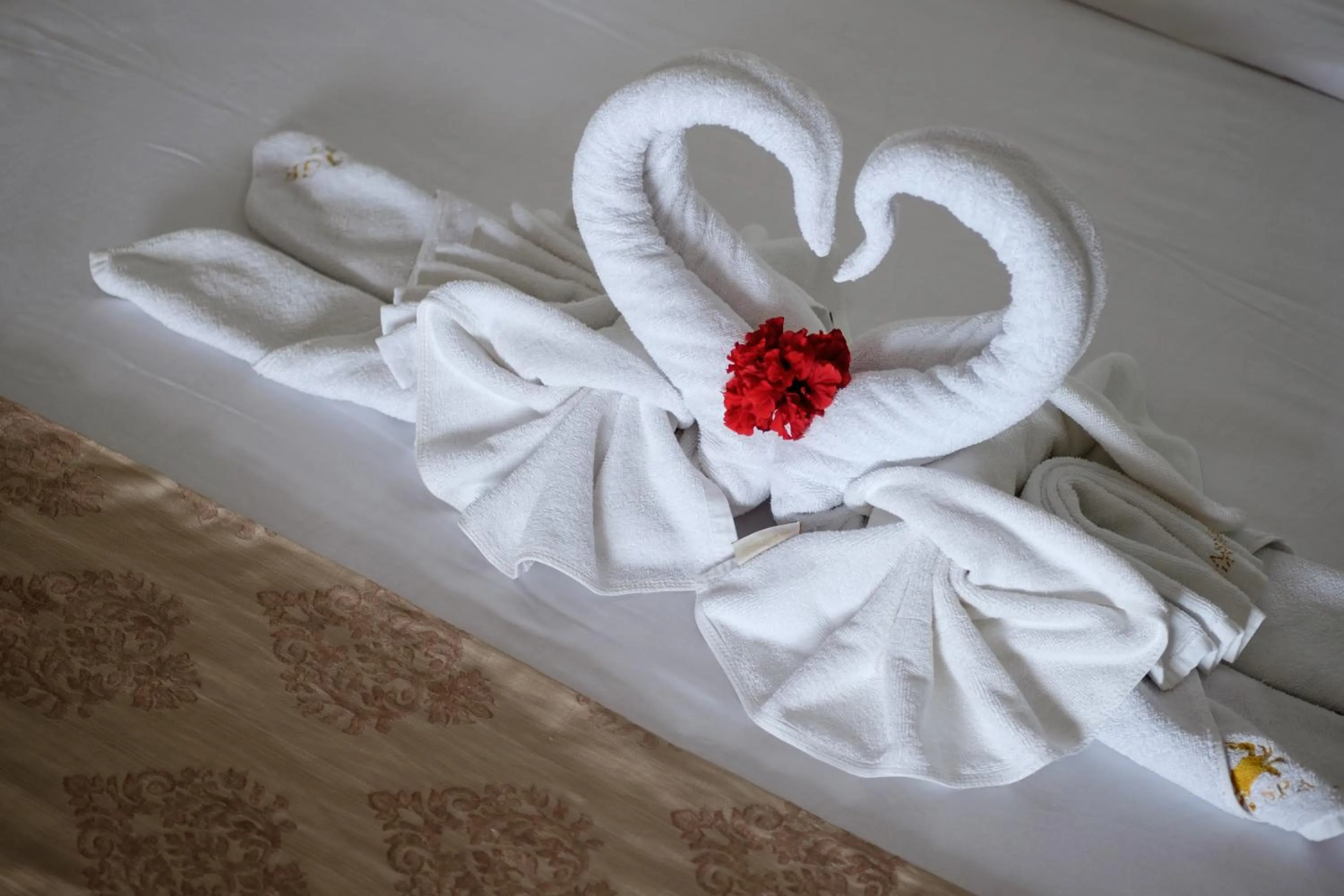 Bed in Kasai Village Dive Resort