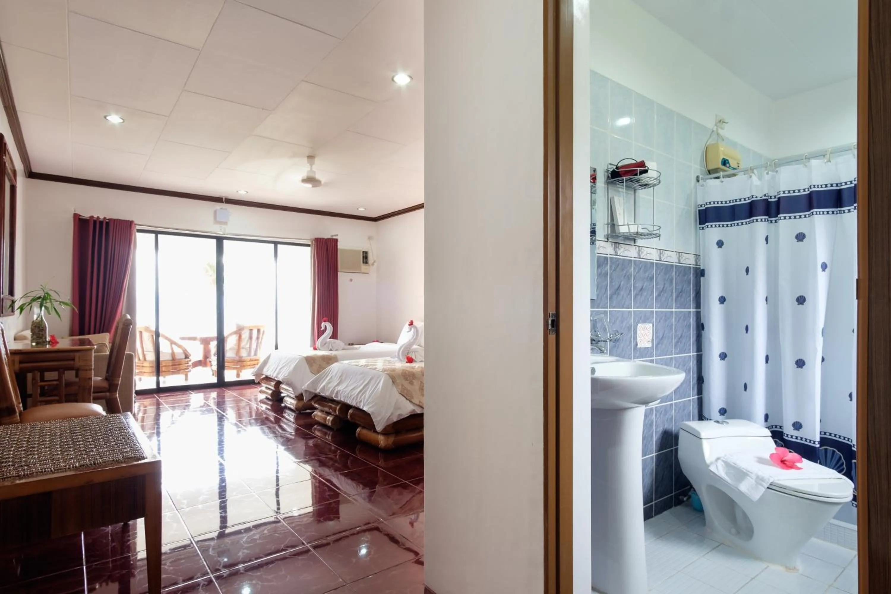 Bed in Kasai Village Dive Resort