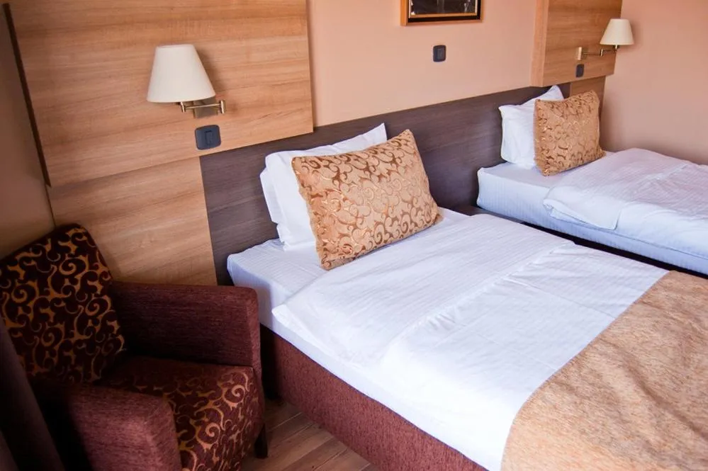 Bed in Hill Hotel Wellness & Spa