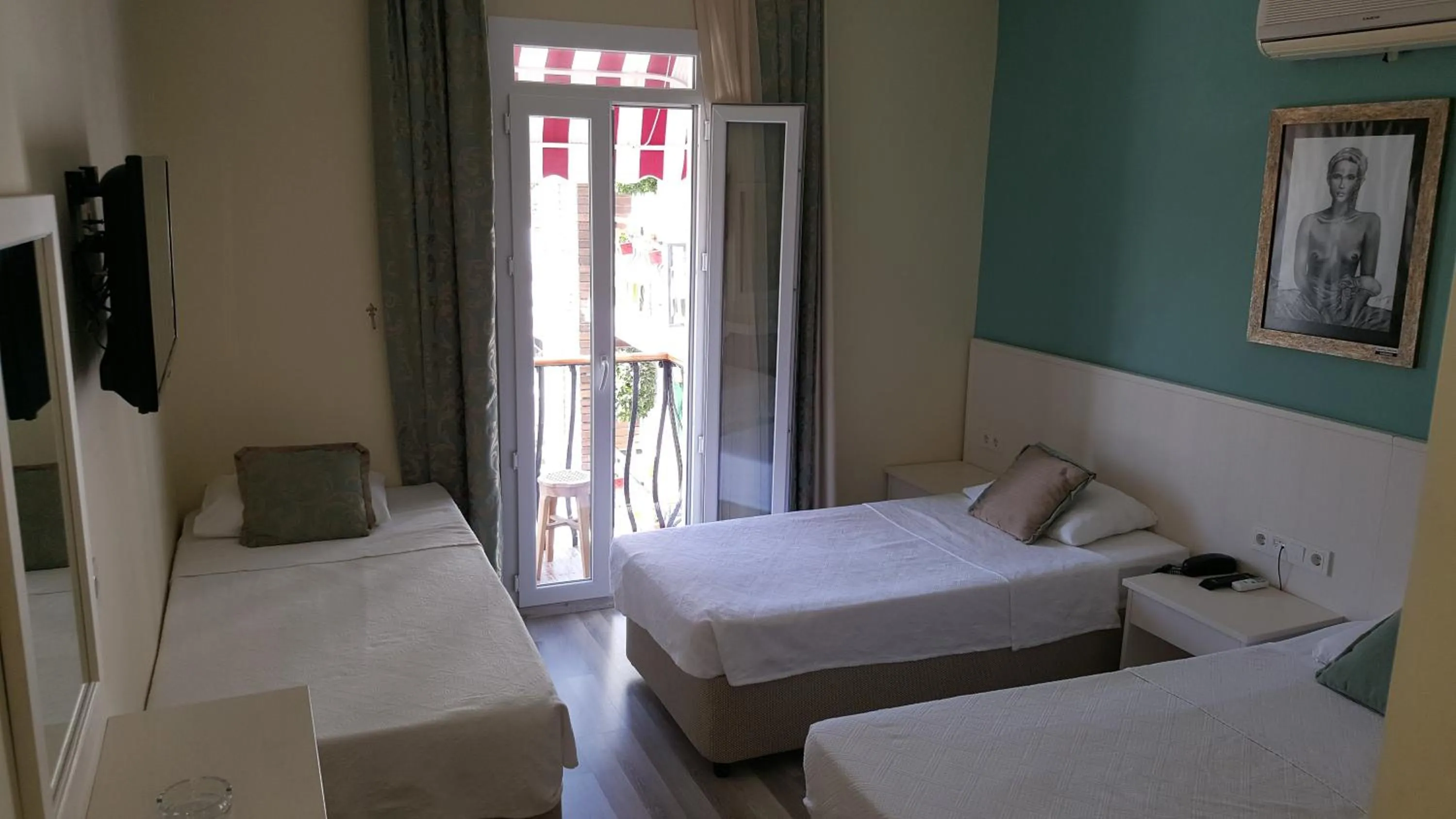 Bed in Artemis Hotel