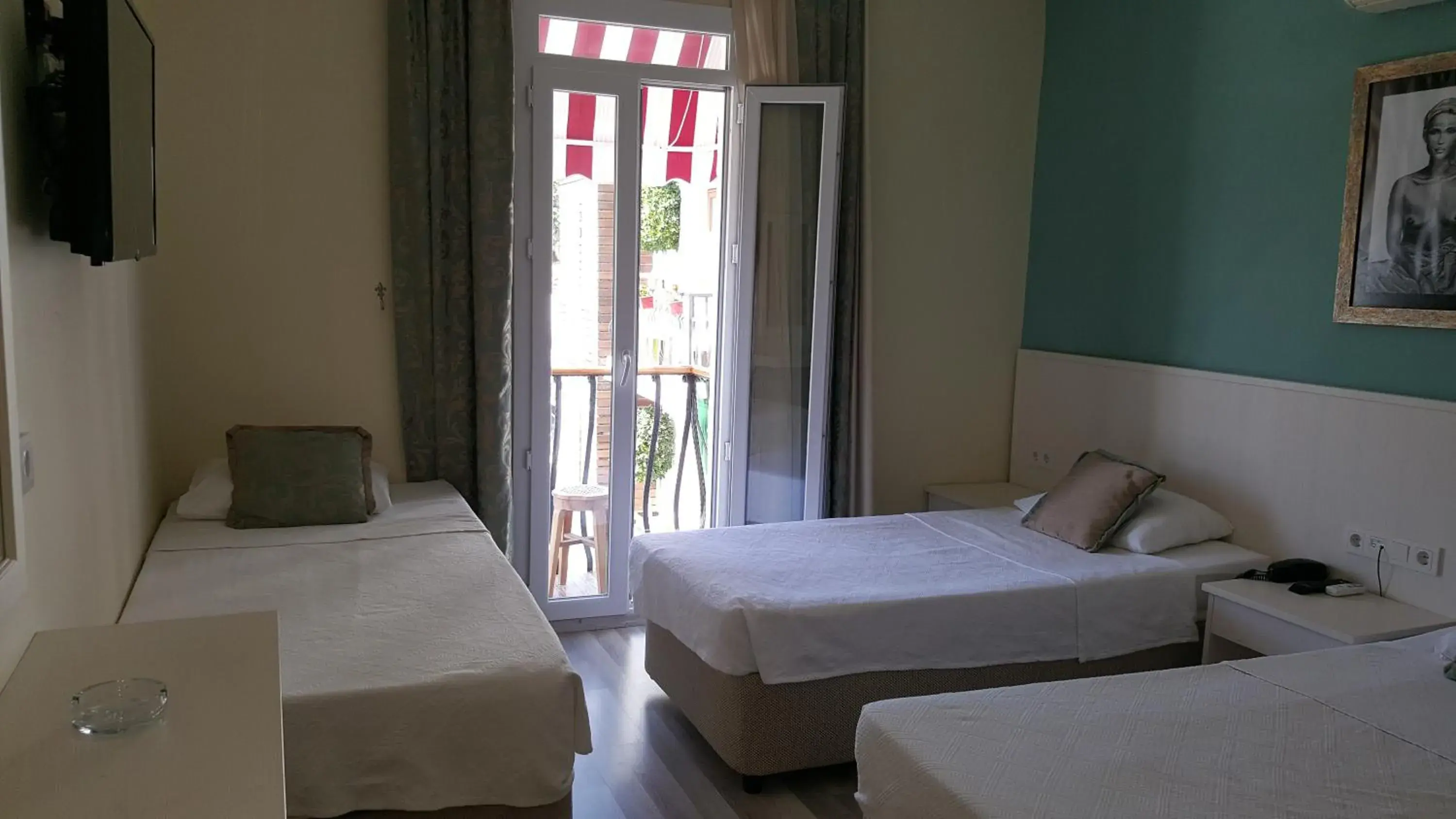 Bed in Artemis Hotel Bed in Artemis Hotel