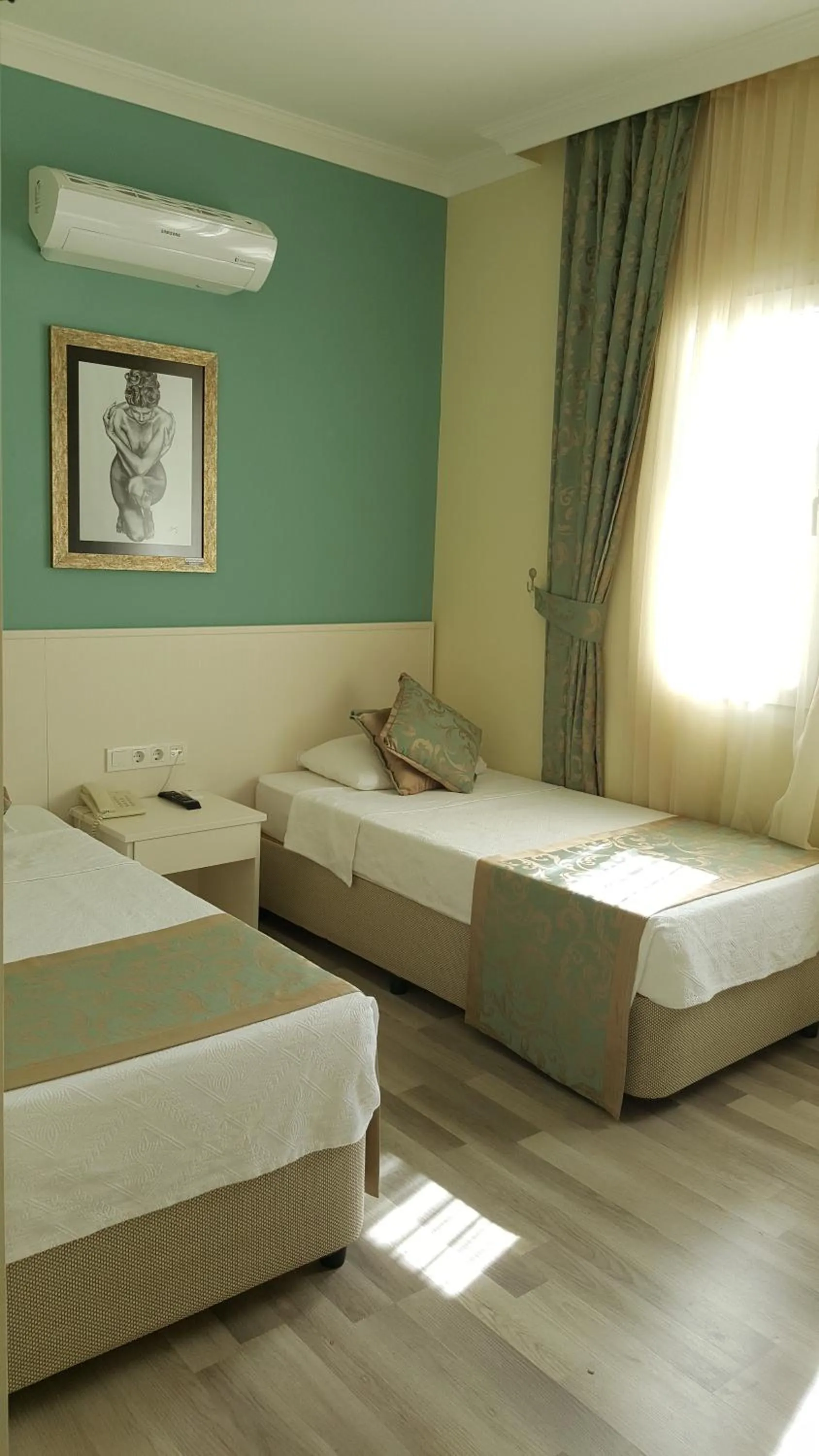 Bed in Artemis Hotel