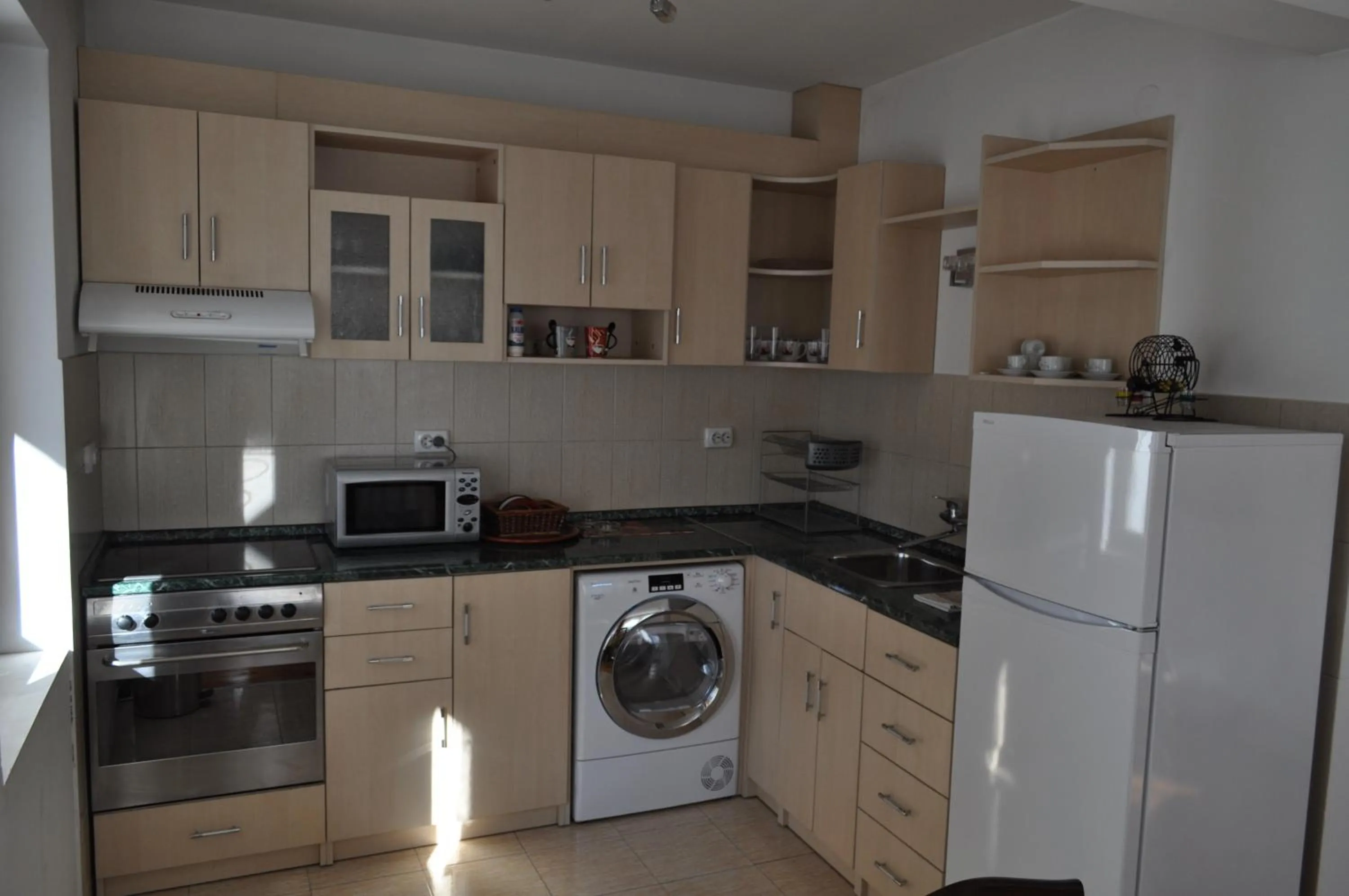 Kitchen or kitchenette in Family Hotel Biju