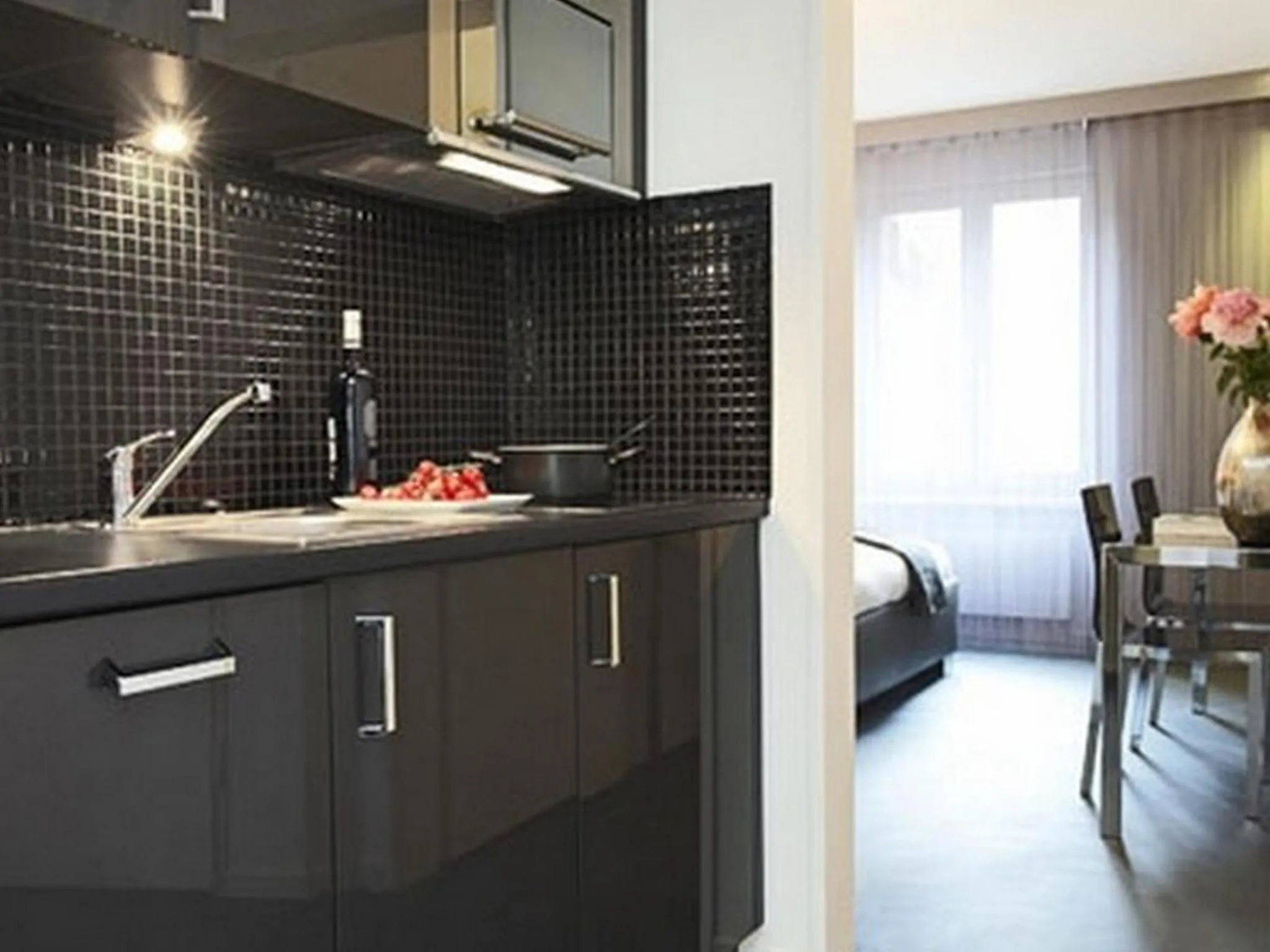 Kitchen or kitchenette in VISIONAPARTMENTS Cramerstrasse 2-6 - contactless check-in