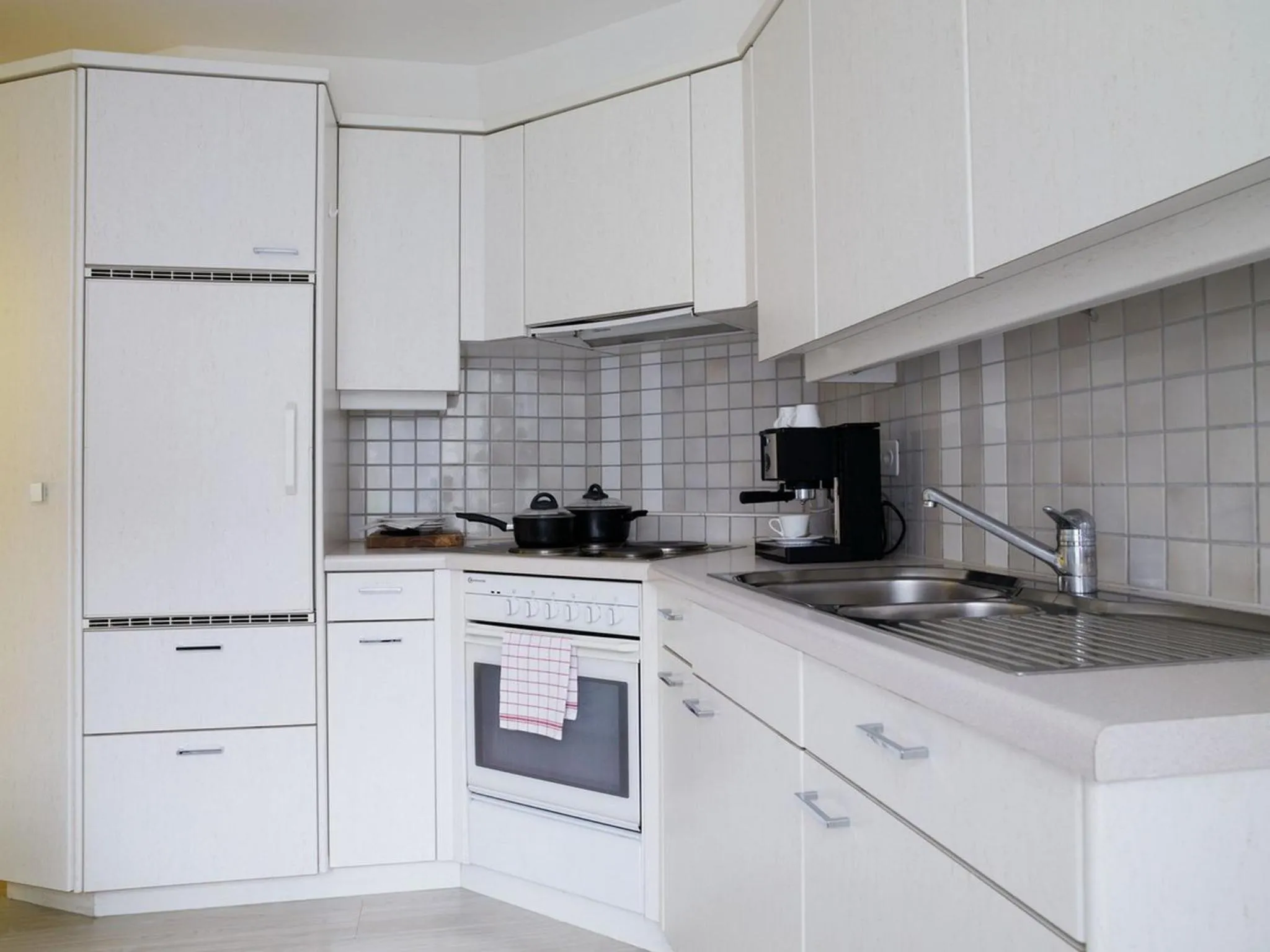Kitchen or kitchenette in VISIONAPARTMENTS Cramerstrasse 2-6 - contactless check-in