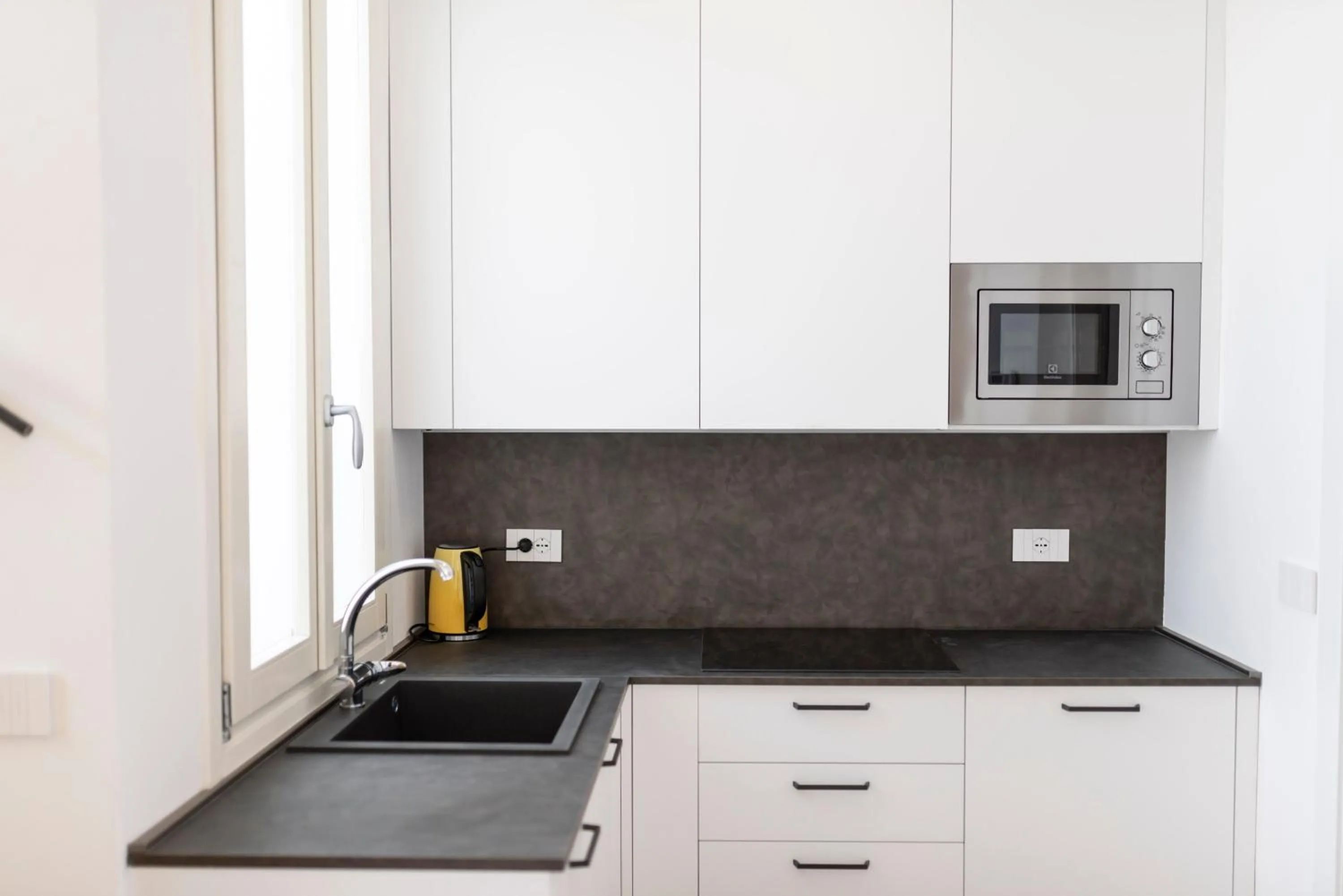 Kitchen or kitchenette in Aromi Piccolo Hotel