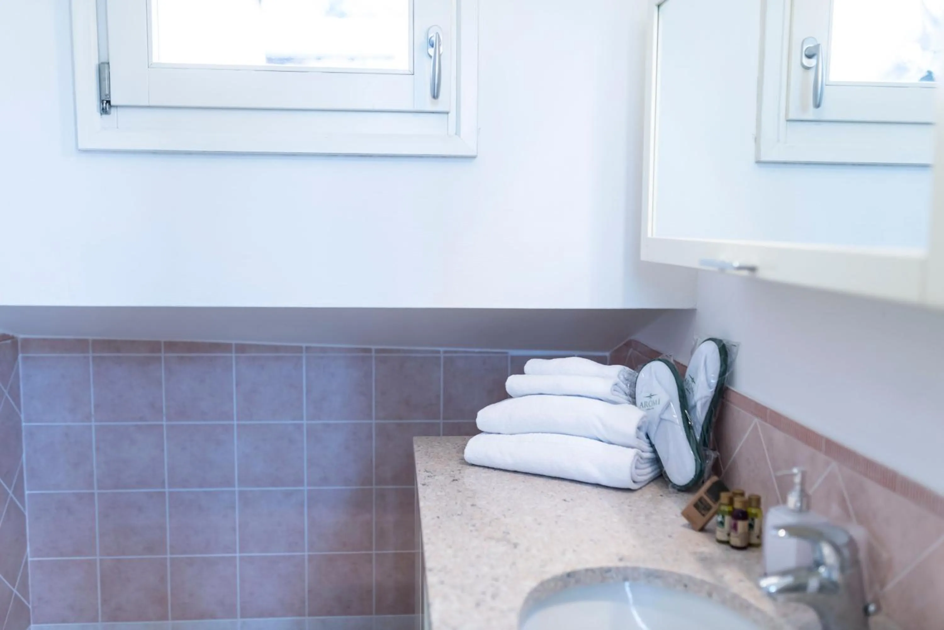 Bathroom in Aromi Piccolo Hotel