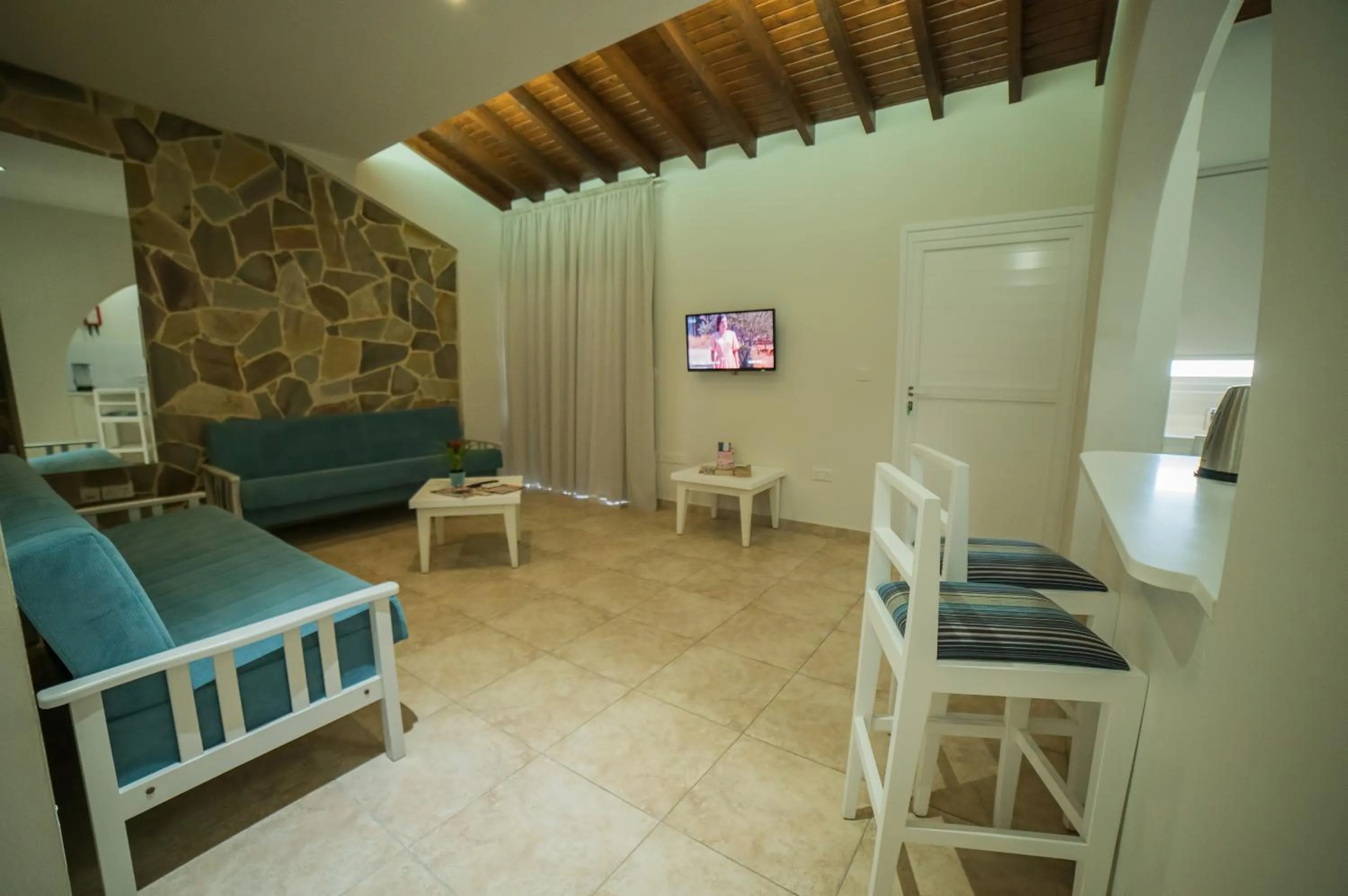 Living room in MyroAndrou Beach Hotel Apartments