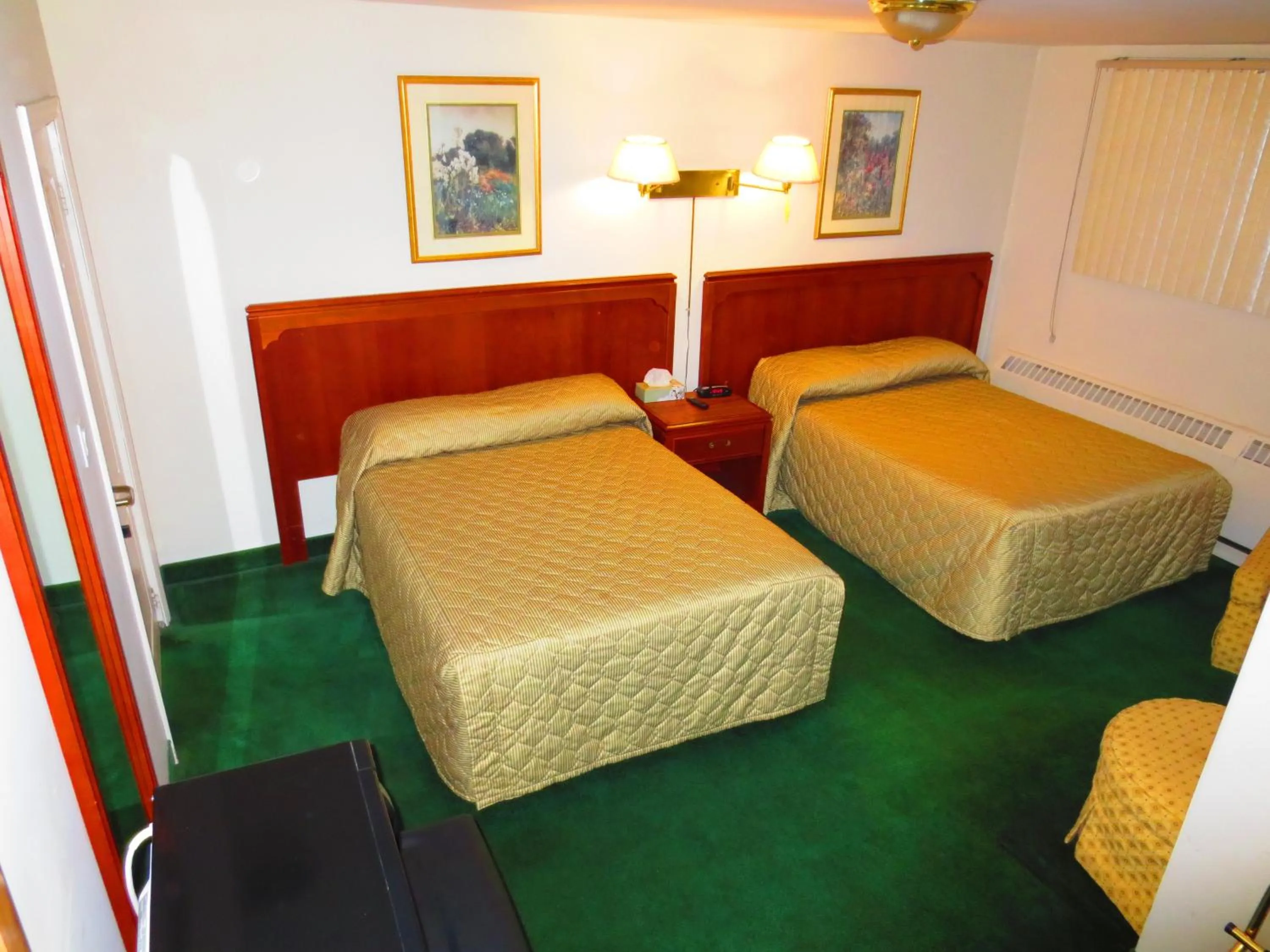 Bed in Canadiana Motel