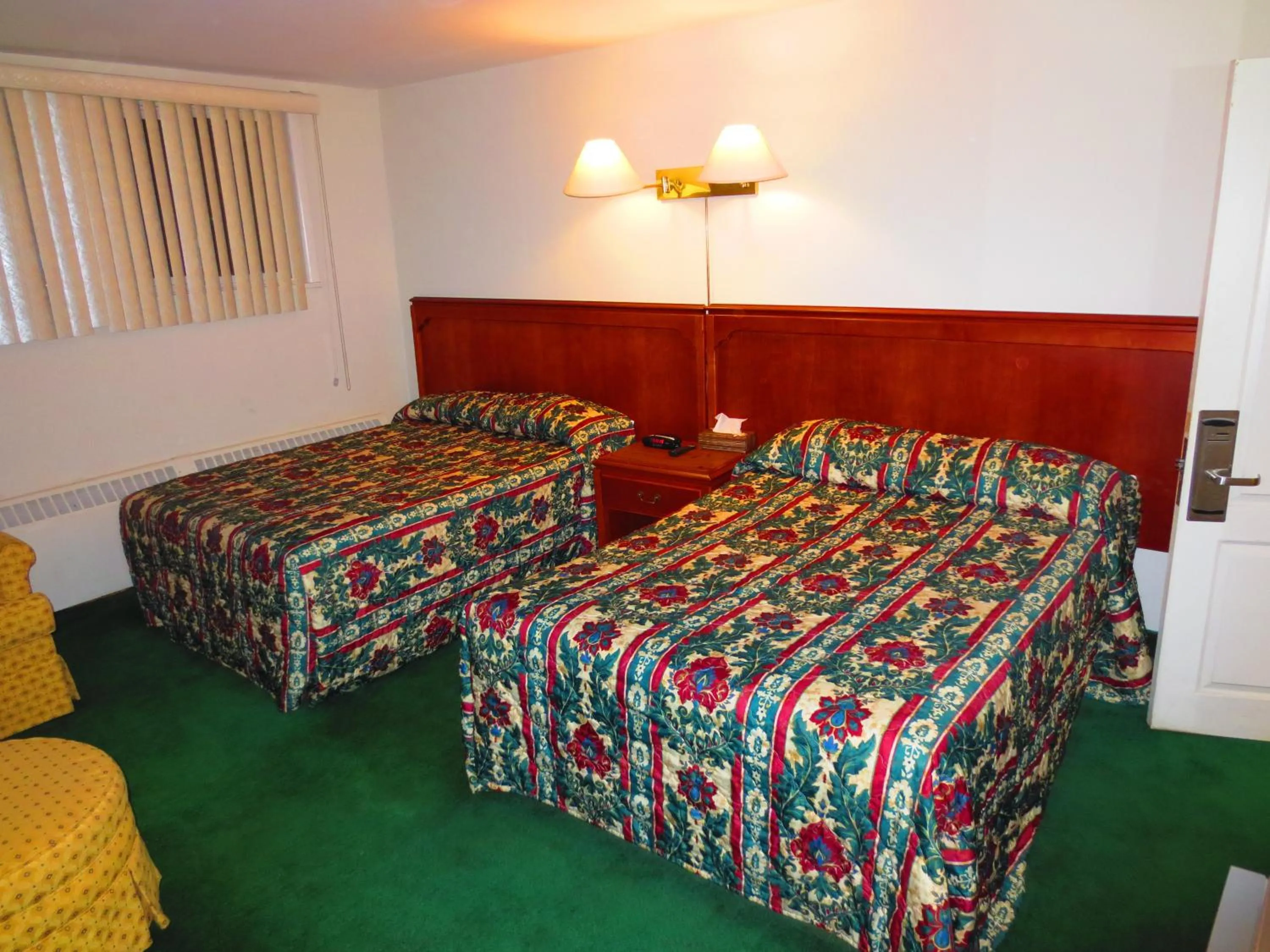 Bed in Canadiana Motel
