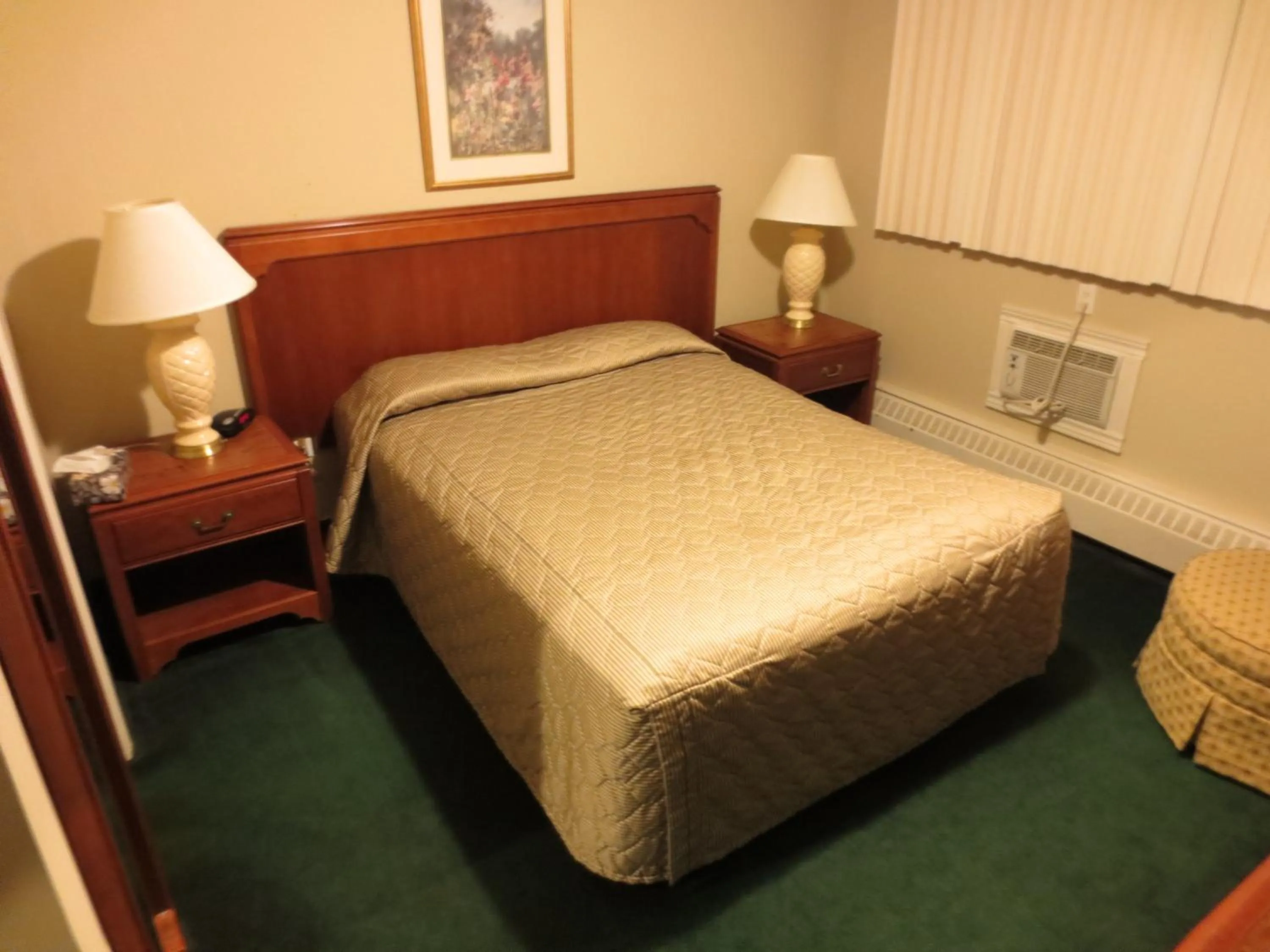 Bed in Canadiana Motel