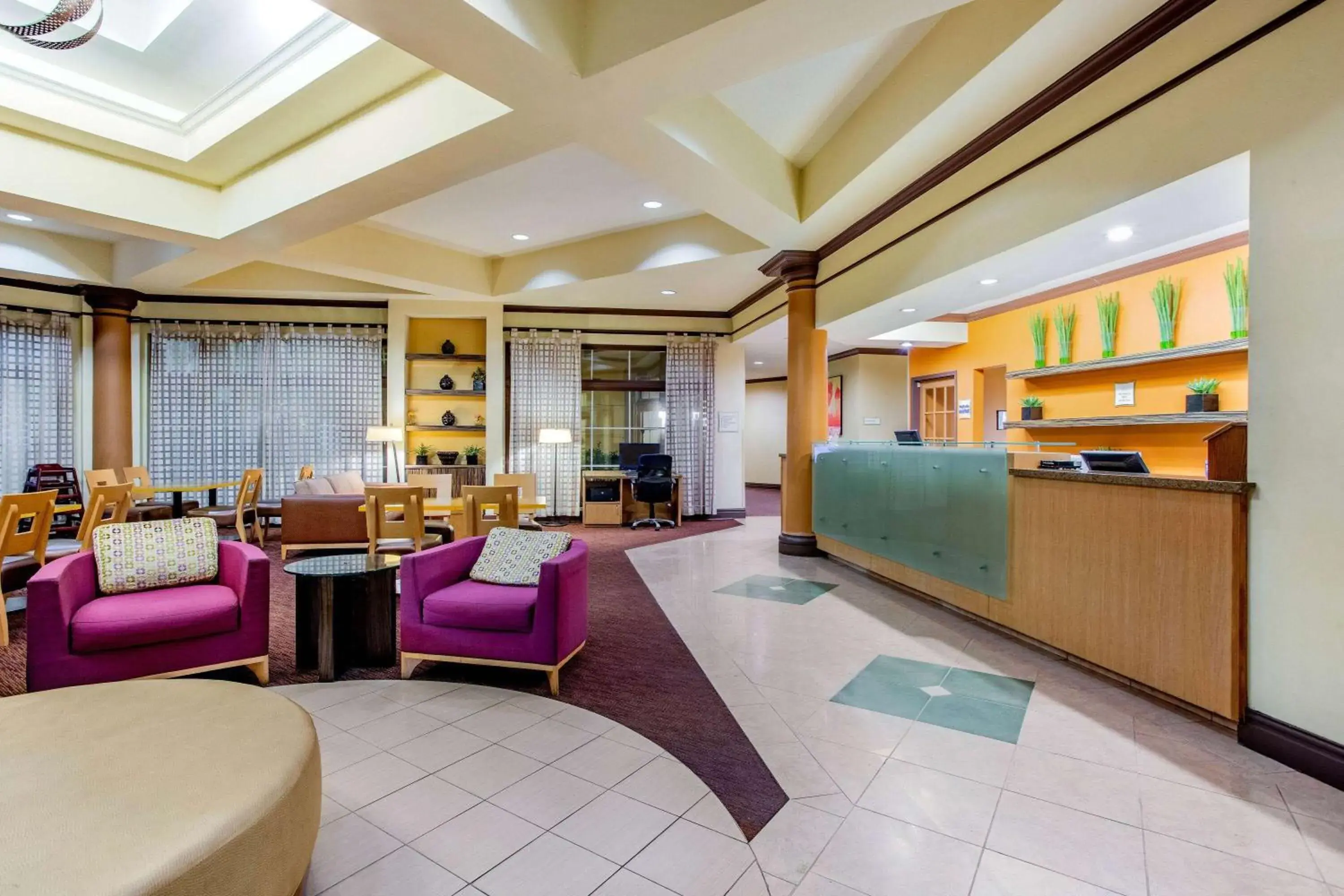 Lobby or reception in La Quinta by Wyndham Raleigh/Durham Southpoint Lobby or reception in La Quinta by Wyndham Raleigh/Durham Southpoint