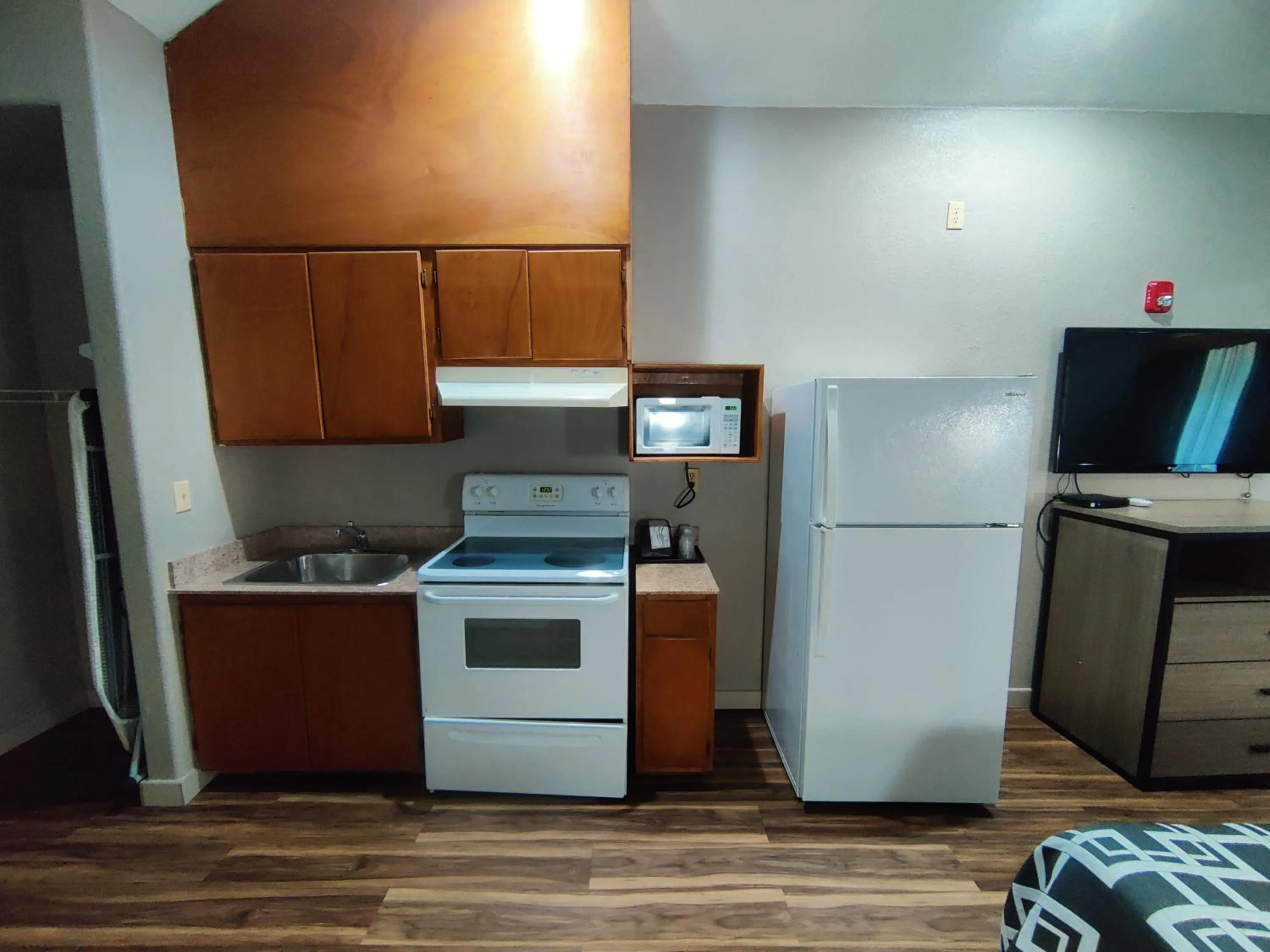Kitchen or kitchenette in Regency Inn & Suites By Capital O Houston IAH Airport