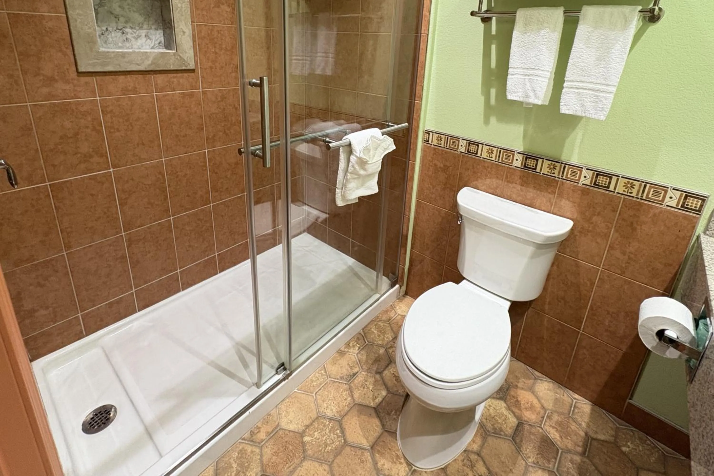 Bathroom in Regency Inn & Suites By Capital O Houston IAH Airport