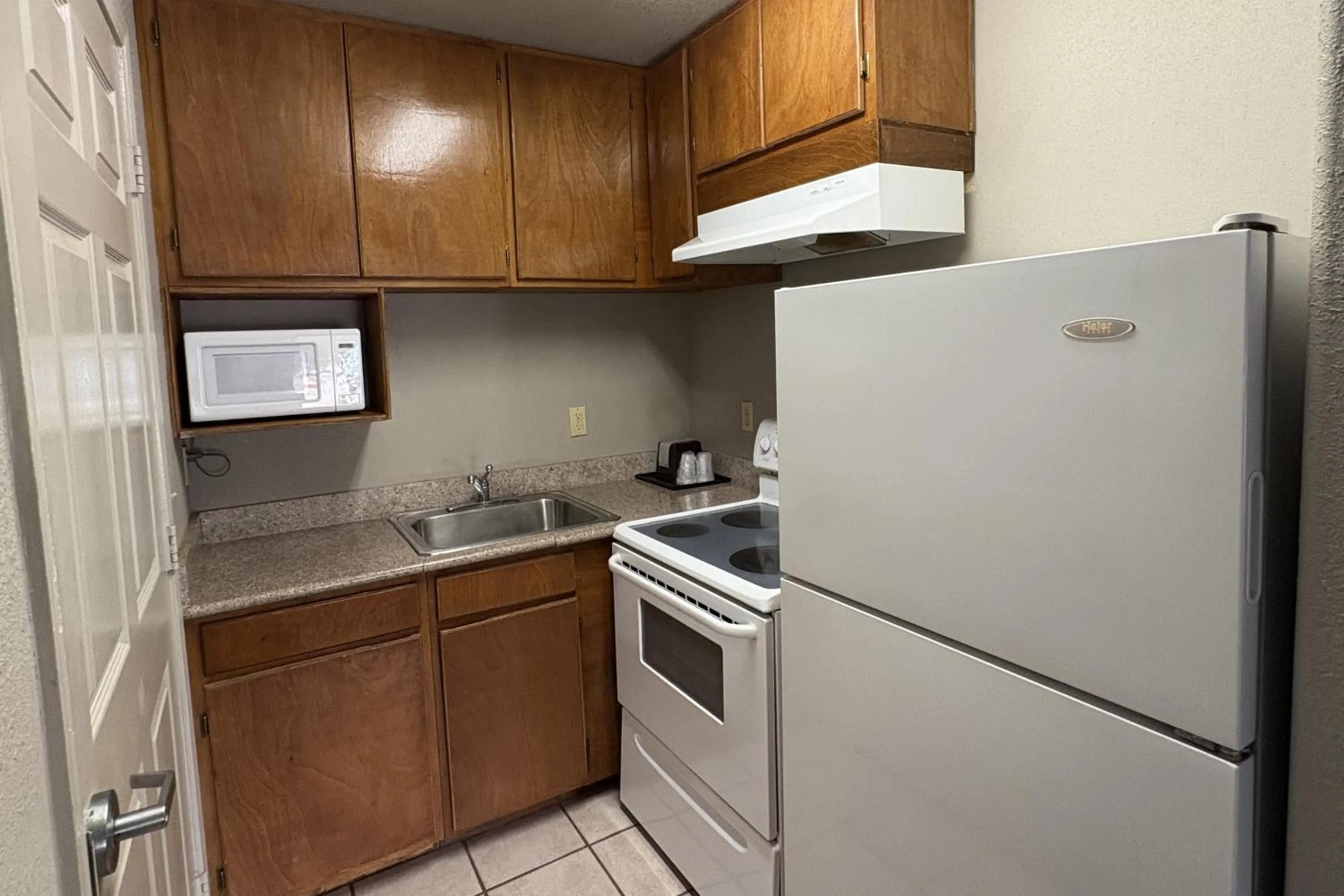Kitchen or kitchenette in Regency Inn & Suites By Capital O Houston IAH Airport